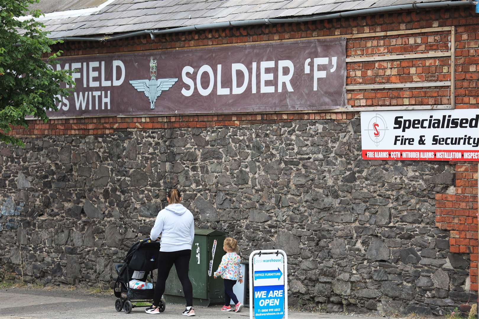 A banner supporting Soldier F hangs from a wall in east Belfast in 2021 (PA)