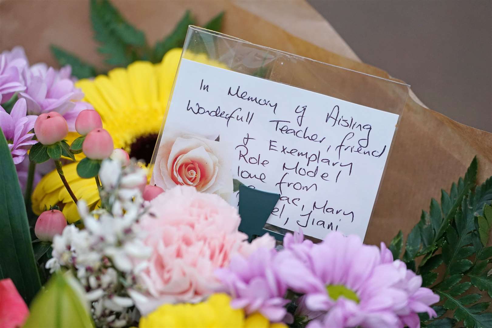 Flowers and messages are left near to the scene in Tullamore, Co Offaly (Brian Lawless/PA)