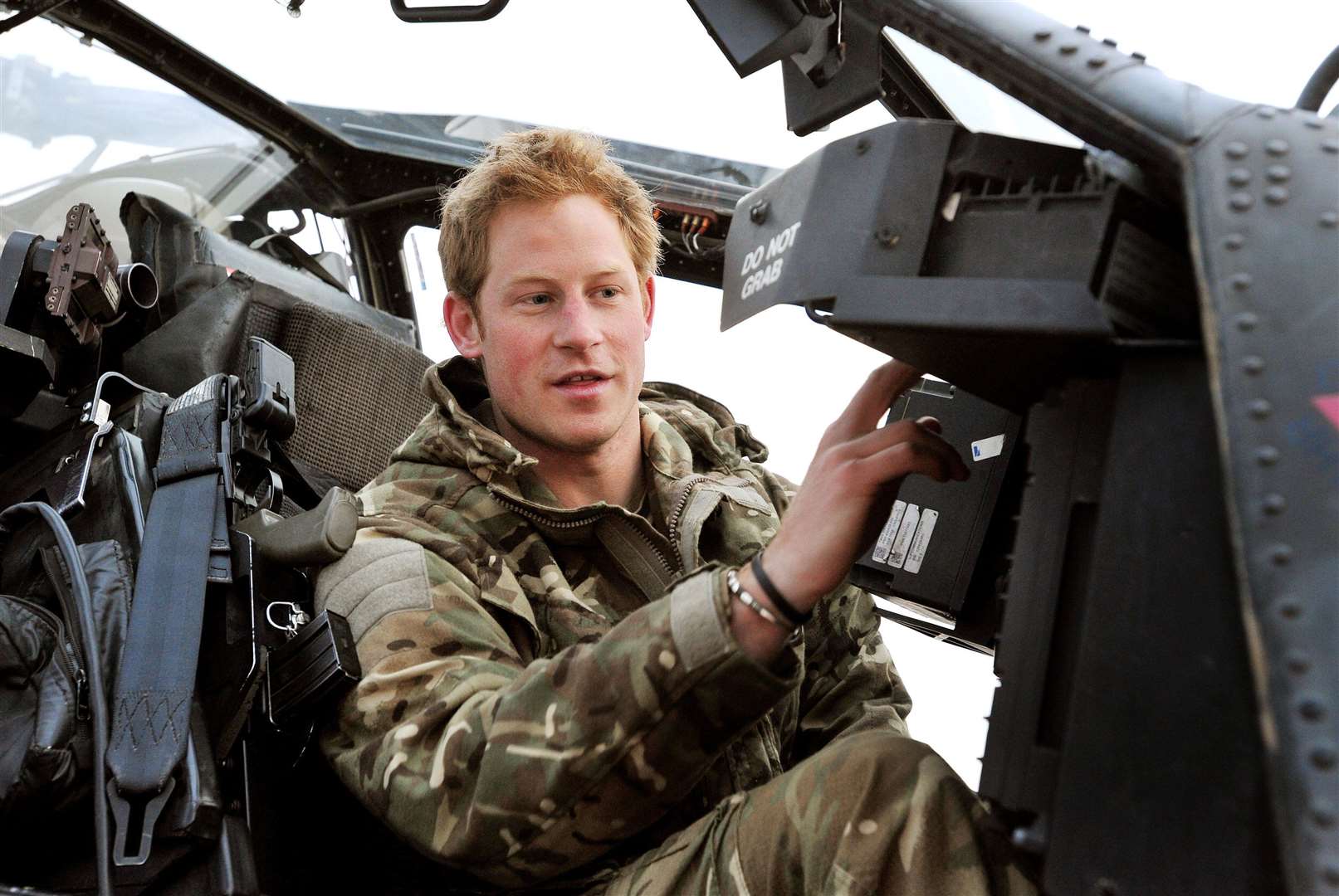 Prince Harry making his early morning pre-flight checks at Camp Bastion, southern Afghanistan (John Stillwell/PA)
