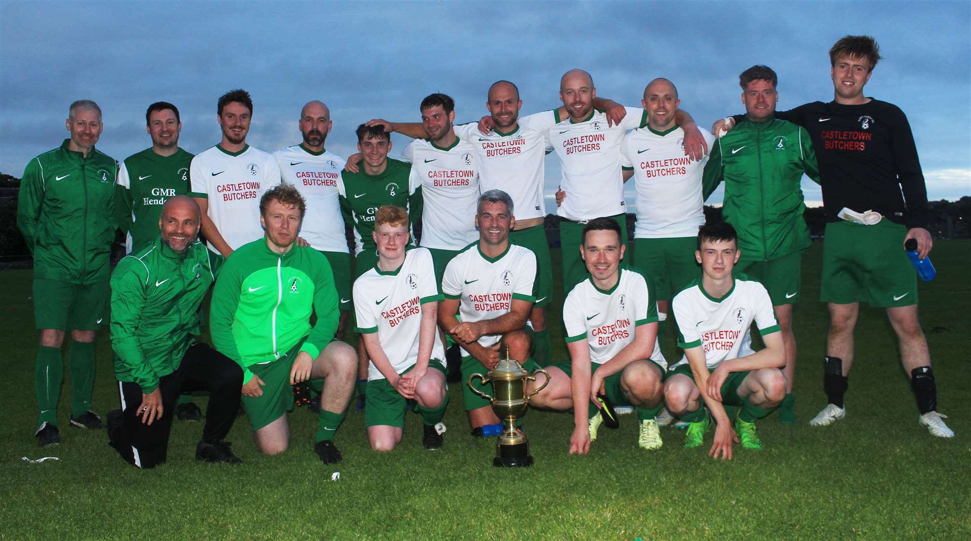 Castletown players with the Caithness AFA play-off trophy after Friday night's victory over Keiss. Picture: Alan Hendry