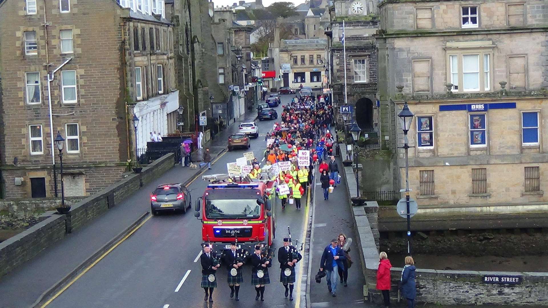 The march travelling through Bridge Street on their way to Caithness General Hospital. Photo: Will Clark