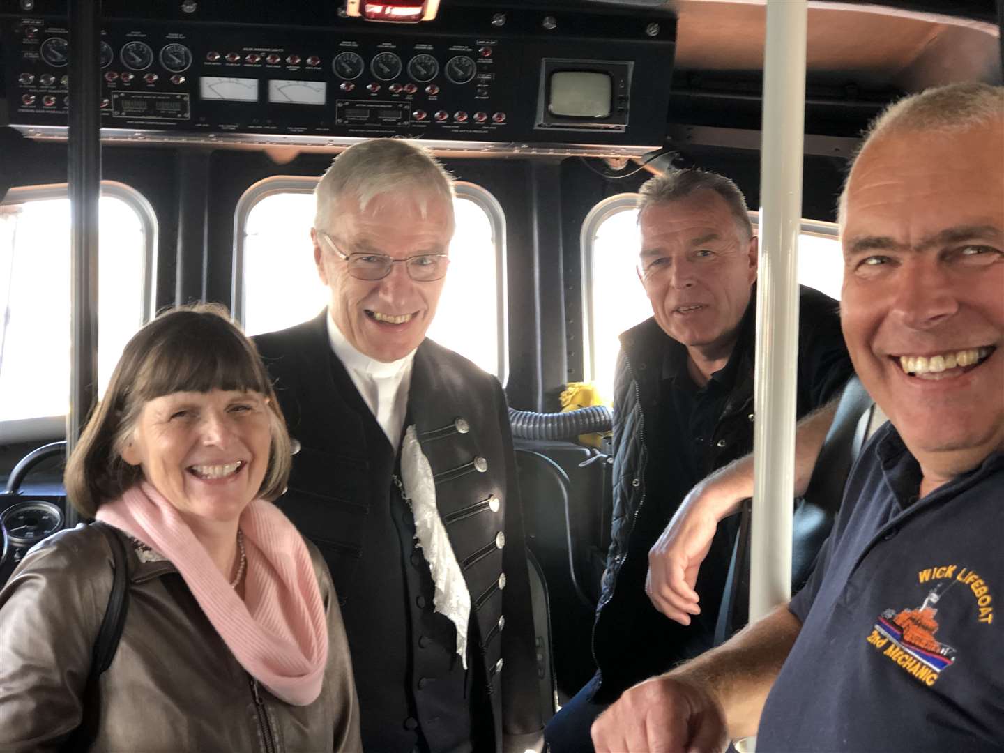 The Moderator and his wife Ruth in the wheelhouse of the Roy Barker II along with acting coxswain Gordon Morrison and second mechanic Graeme Campbell (right). Picture courtesy of RNLI