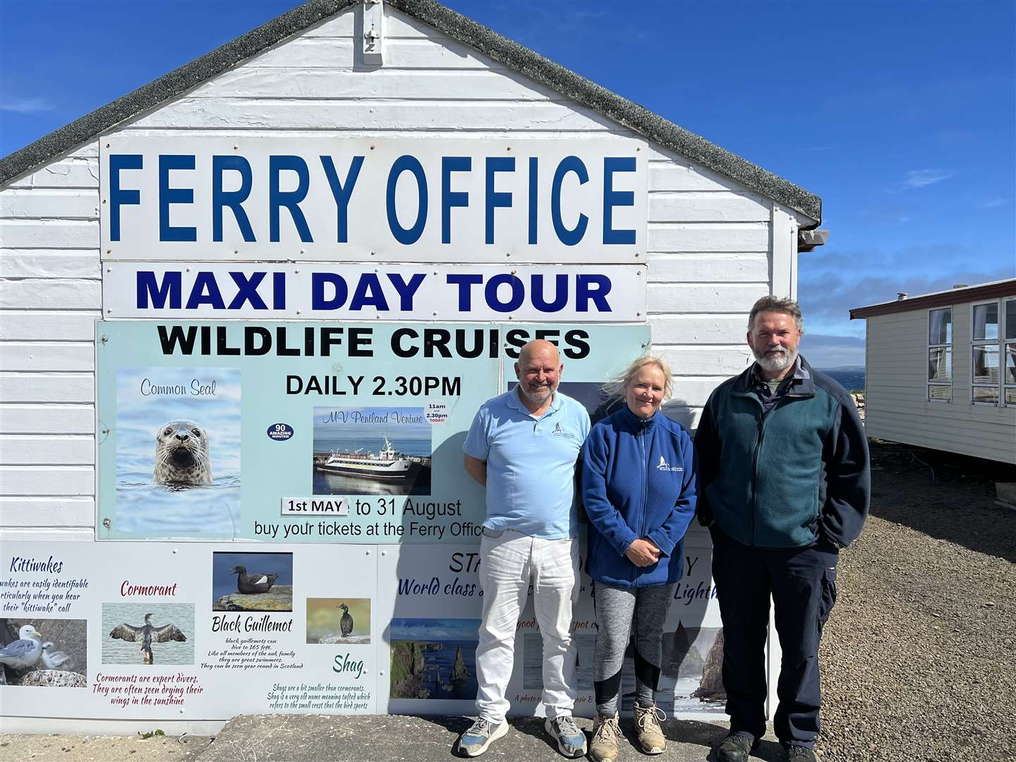 From left: Fred and Deborah Fermor with Deborah's brother Ivor Thomas outside the ferry office.