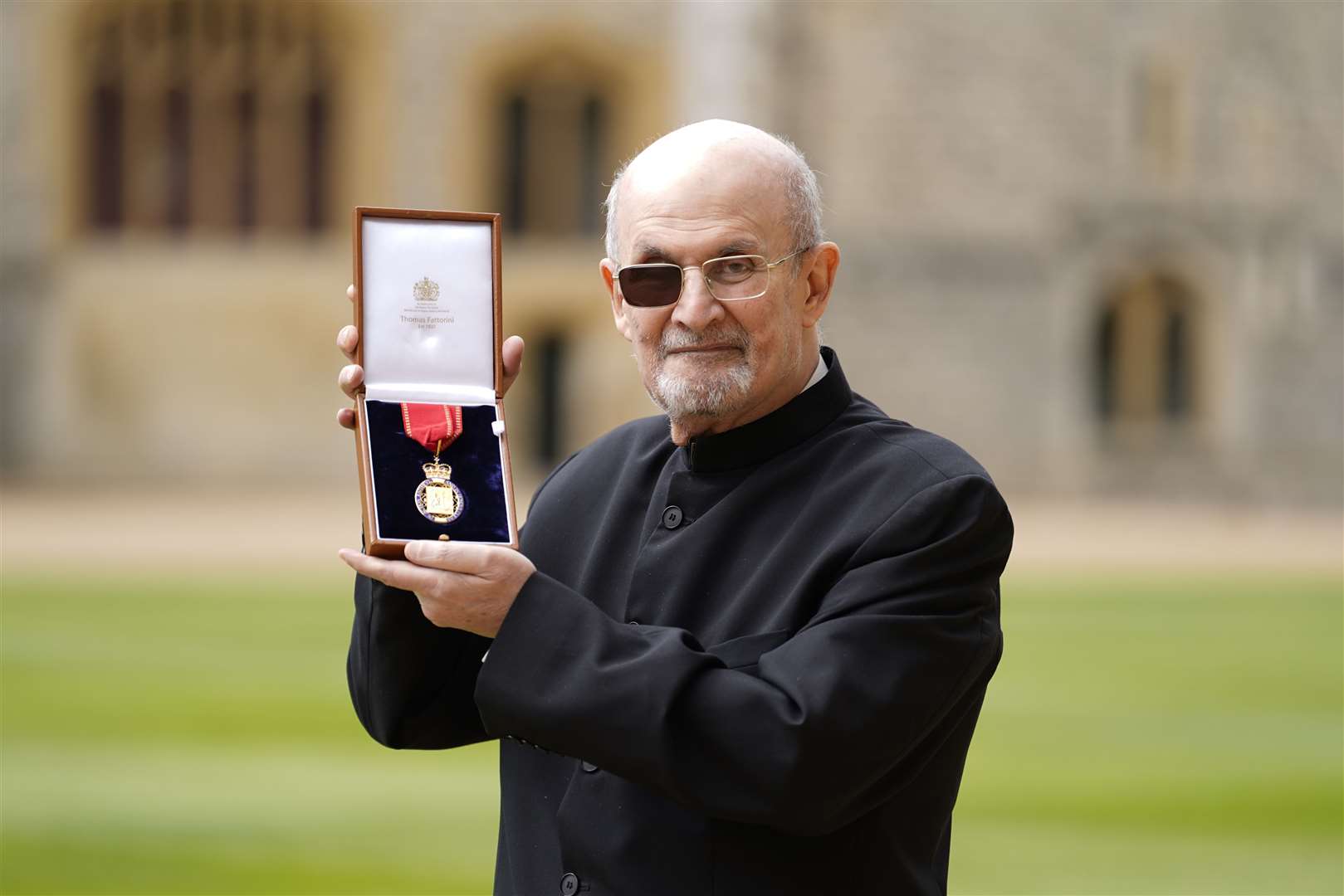 Sir Salman Rushdie was made Servant of the Companions of Honour at Windsor (Andrew Matthews/PA)