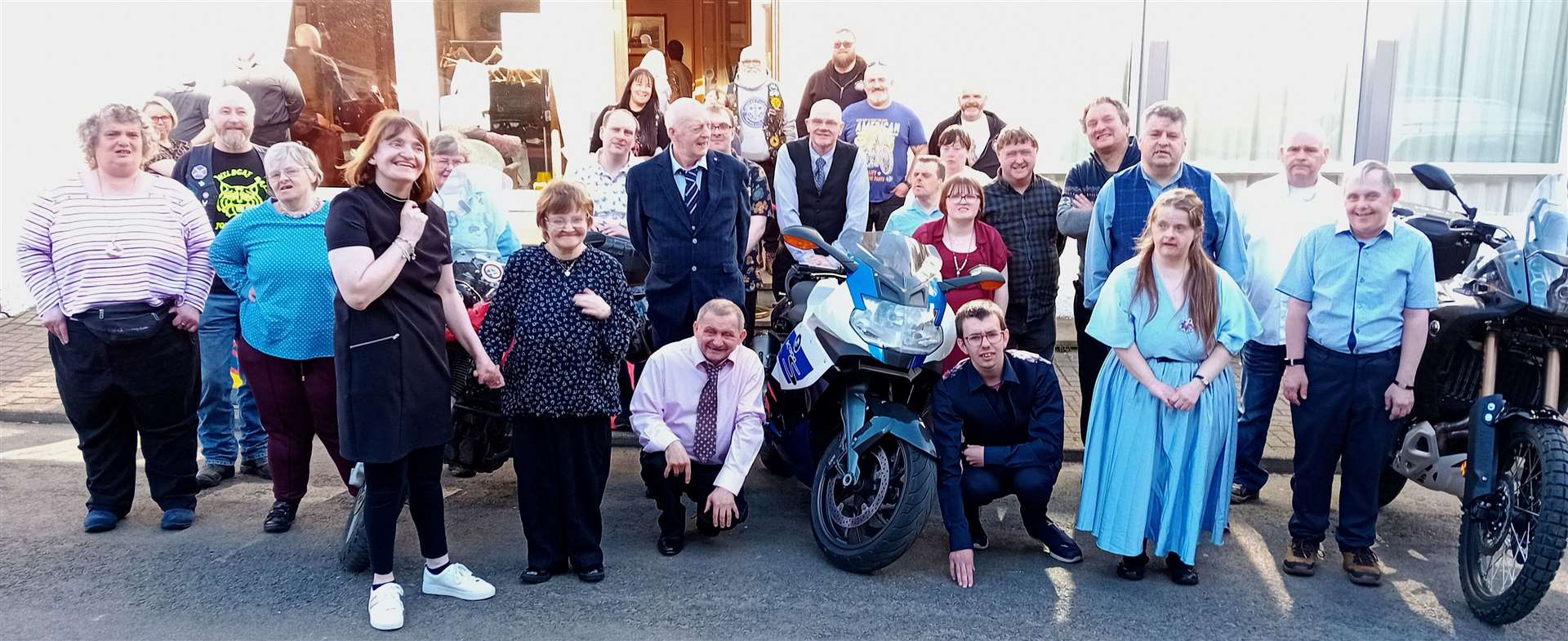Members of Enable gather outside Mackays Hotel in Wick to say a huge thank-you to the bikers from Team MCC who joined in the celebrations by gifting Easter eggs for everyone at the tea dance. Picture: Willie Mackay