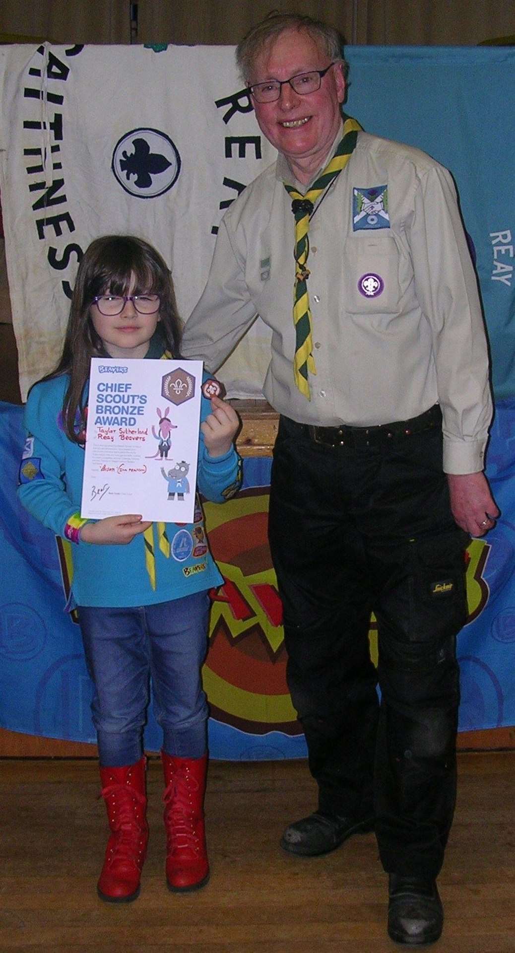 Chief Scout's Bronze Award winner Taylor Sutherland with Reay Beaver leader Ian Pearson.