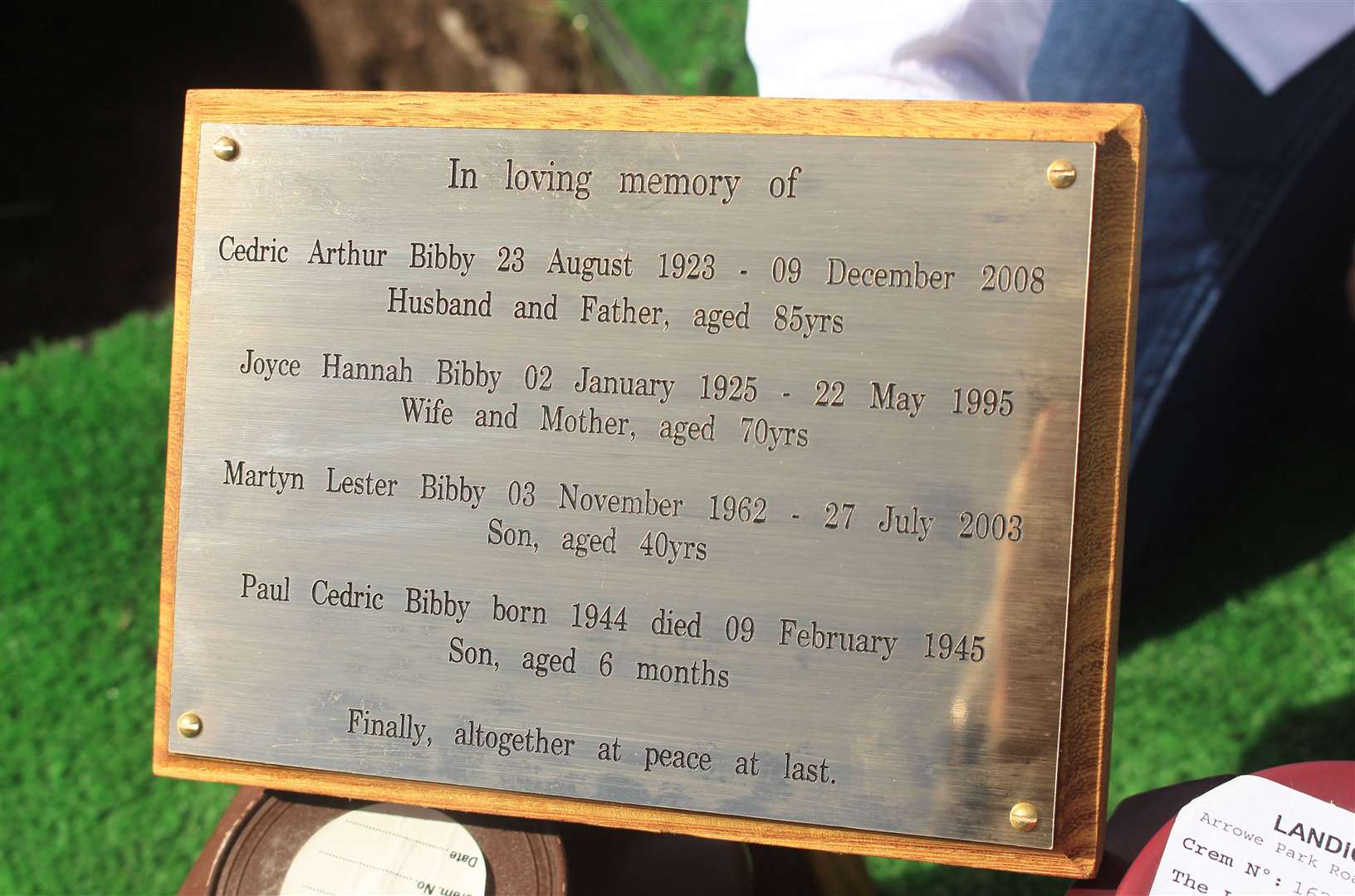 The plaque engraved with the names of Cedric, Joyce, Martyn and baby Paul.