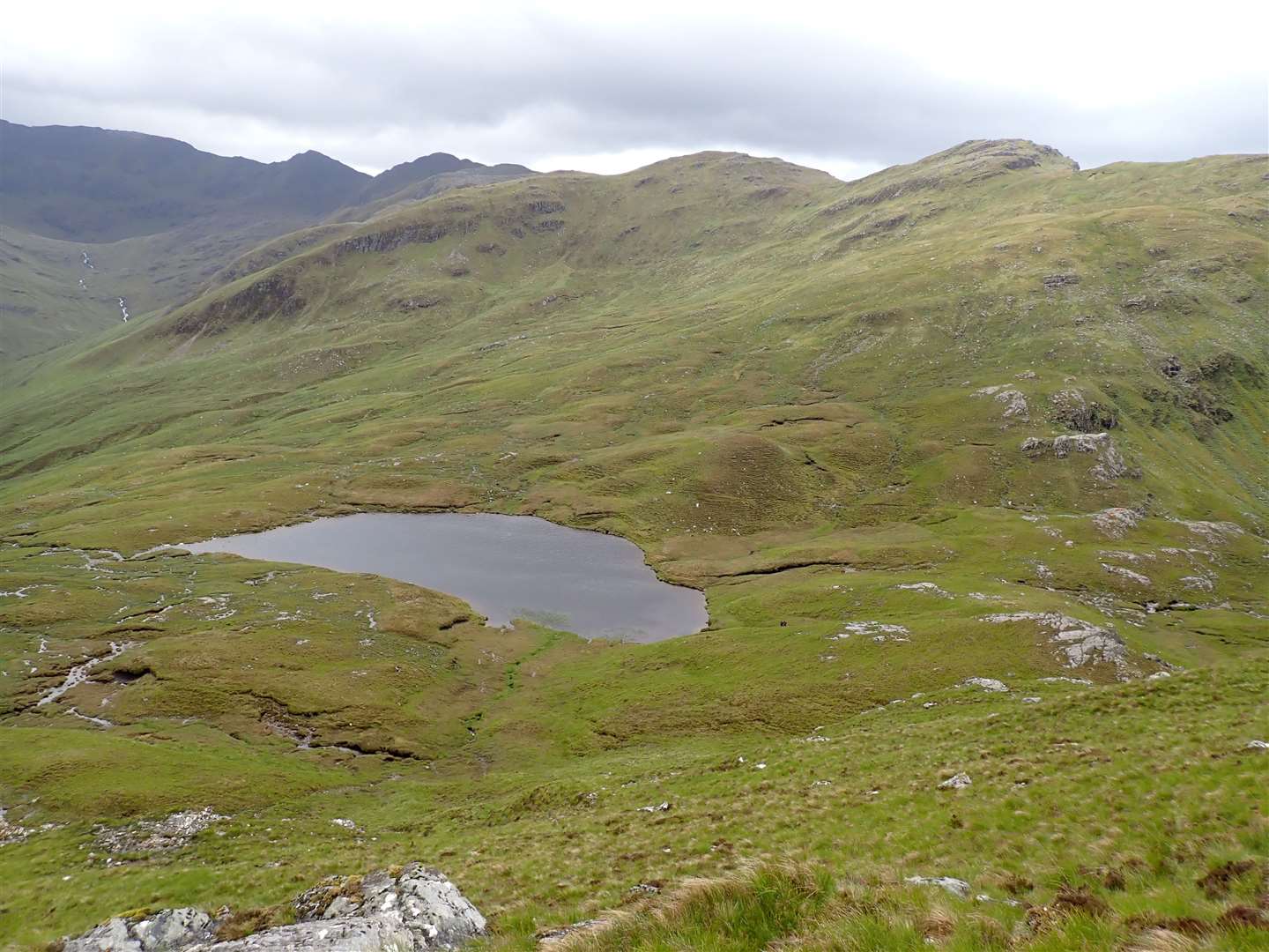 Loch Coire nan Crogachan sits just below the bealach between Glen Shiel and Glen More.