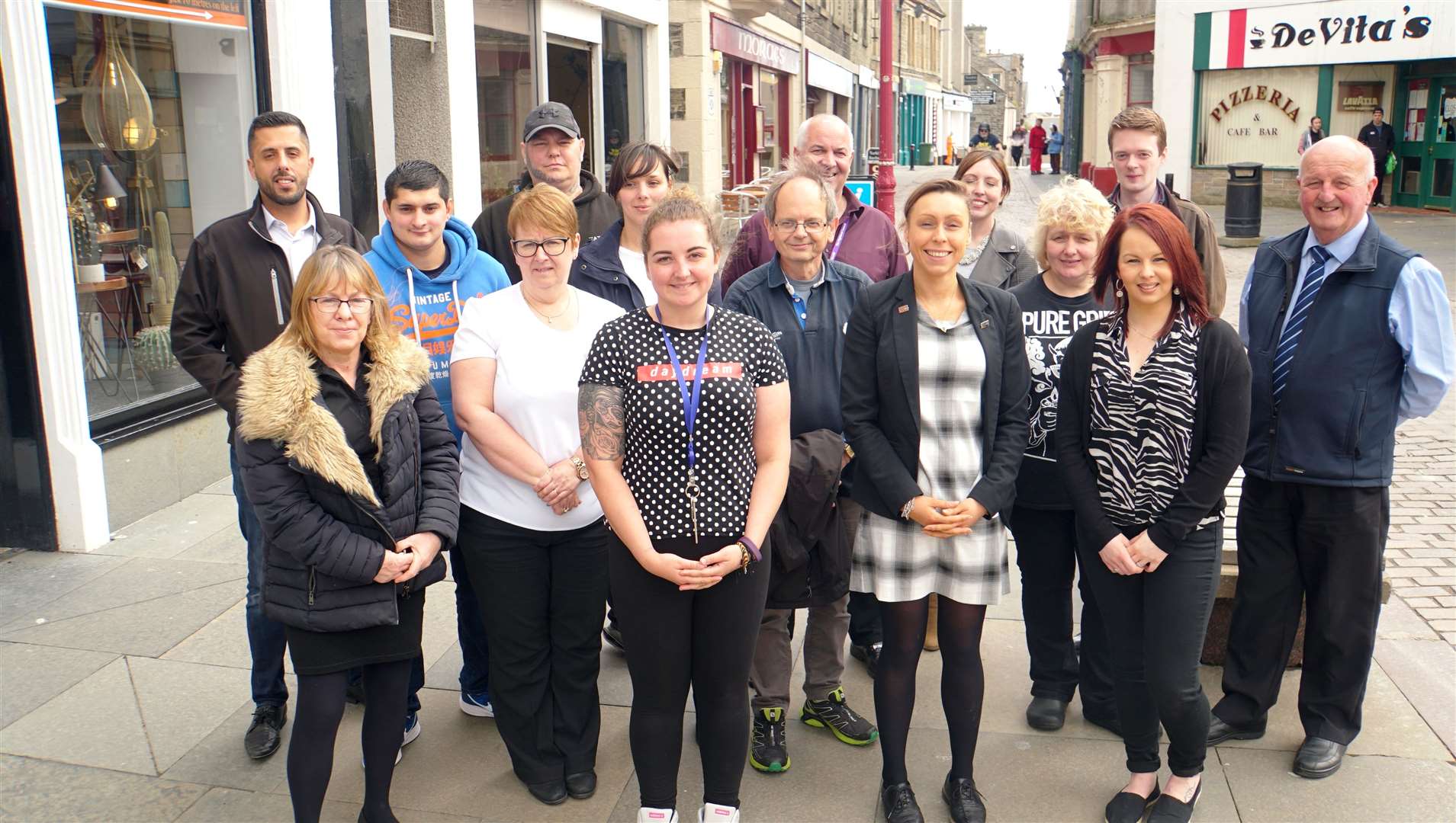 Wick councillors celebrate the funding initiatives along with town centre traders and stakeholders. Picture: DGS