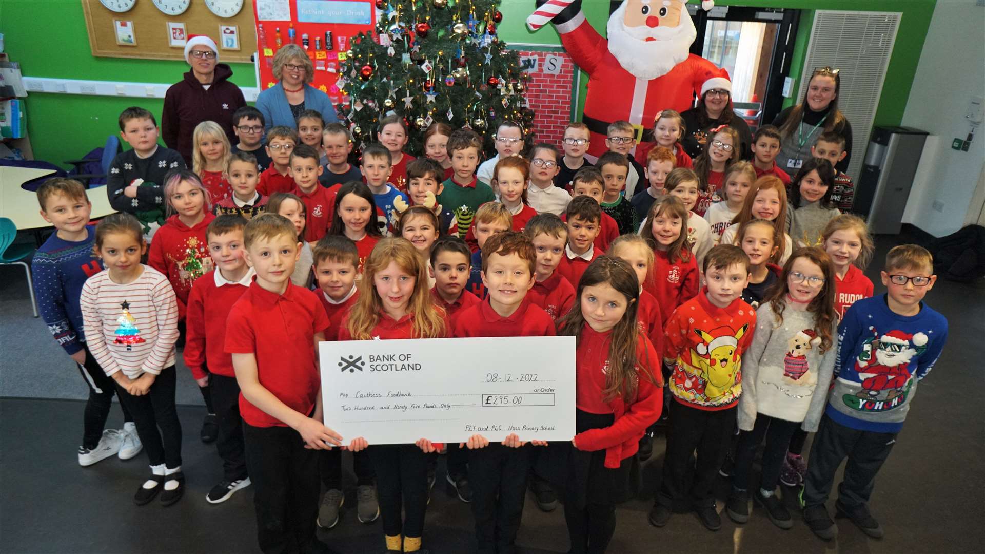 Noss Primary 4 Green and Yellow classes made 'reindeer dust' and sold it to make the grand total of £295 for the local food bank. The reindeer dust is made from oats and sprinkled on the lawn to encourage Santa to pay a visit. Picture: DGS