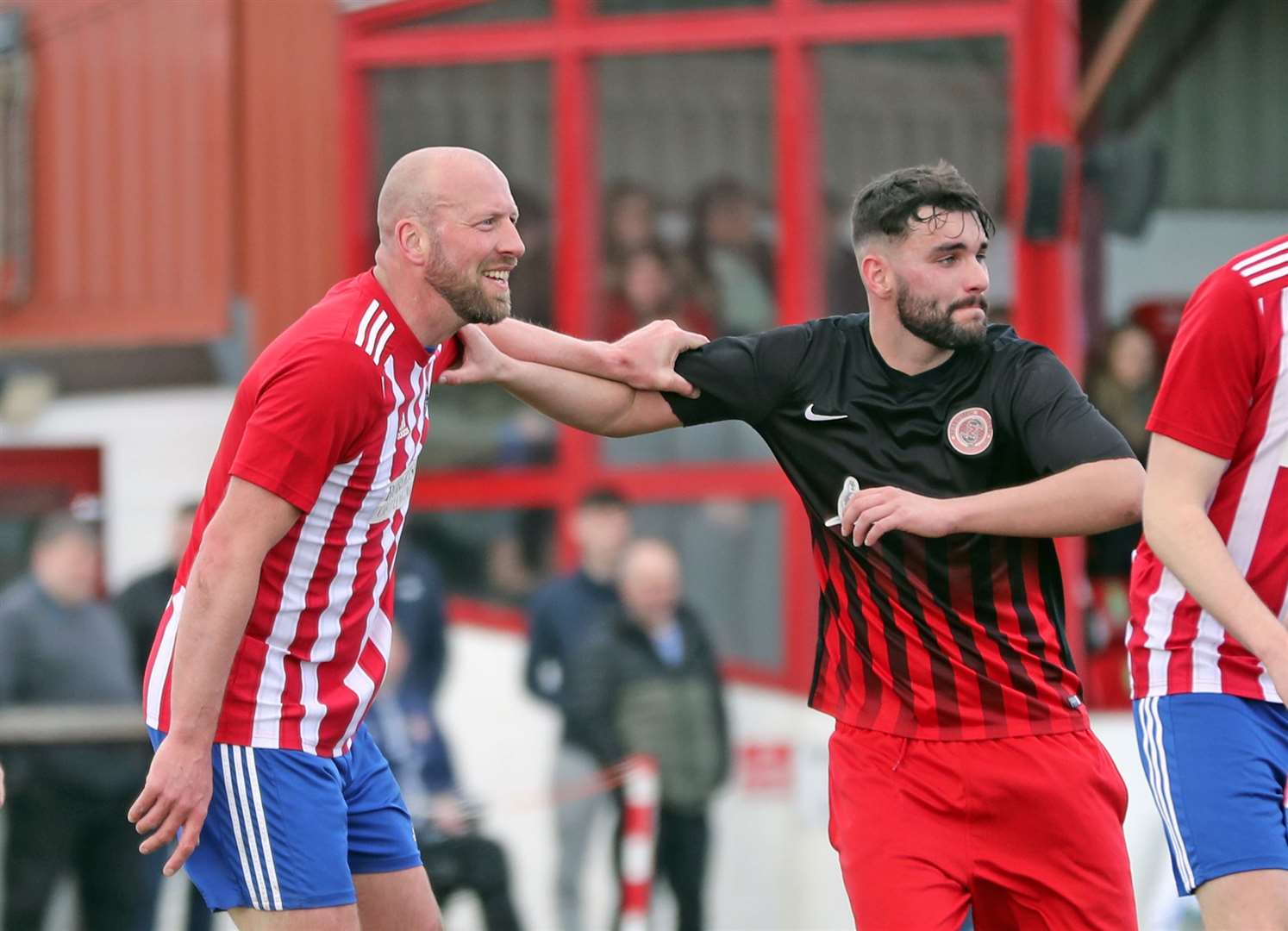 Ross Tokely and Ryan Sutherland get to grips with each other at Dudgeon Park. Picture: James Gunn