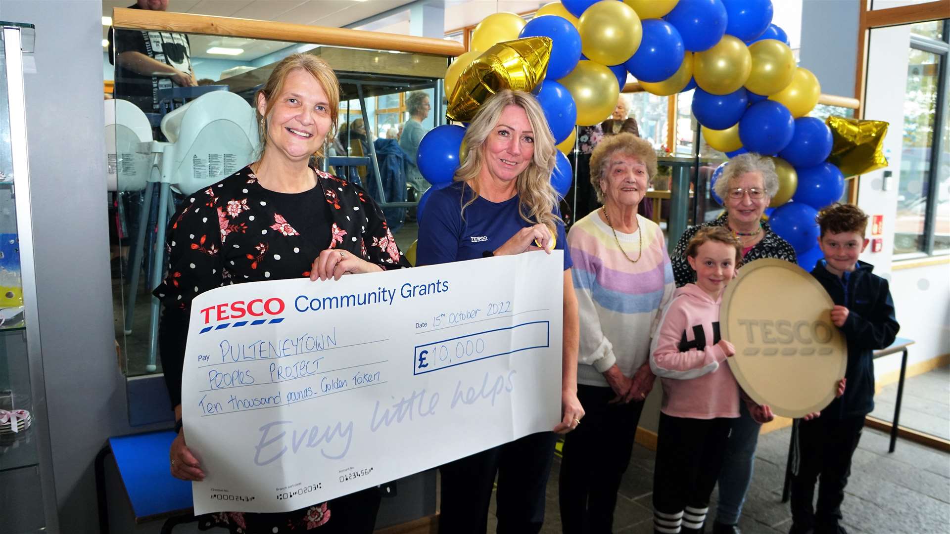 Wick Tesco handed over a cheque for £10K to the PPP Lunch Club for the Elderly. From left, Jennifer Harvey (development officer at PPP), Karen Center (Tesco community champion), Kathleen Sinclair from the lunch club along with Jane McCarthy who picked PPP's lunch club as the beneficiary and her grandchildren Carey and Alex. Picture: DGS