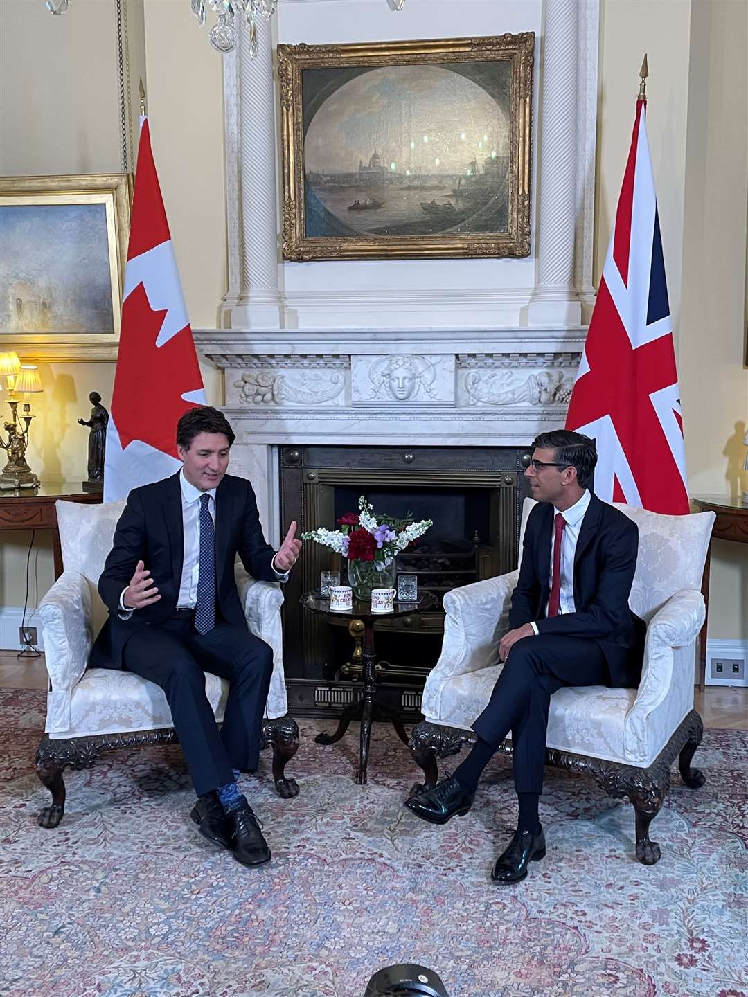 Justin Trudeau and Rishi Sunak exchanged warm words ahead of their private talks in No 10’s White Room (Sophie Wingate/PA)