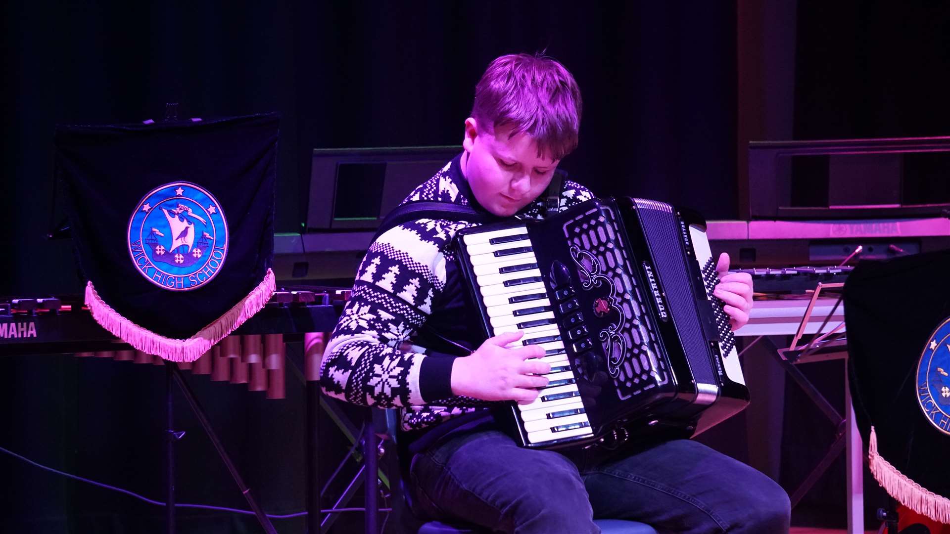 Jack Simpson from S5 plays the accordion known locally as 'e boxie. Picture: DGS