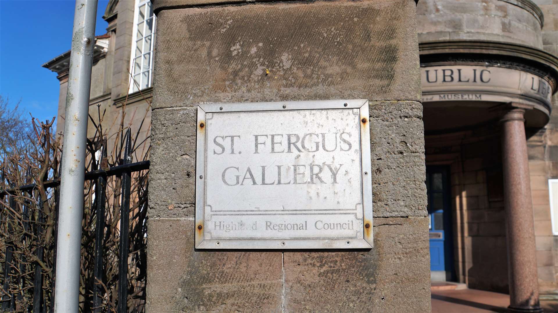 An outdated and tarnished sign for the gallery many thought had already closed.