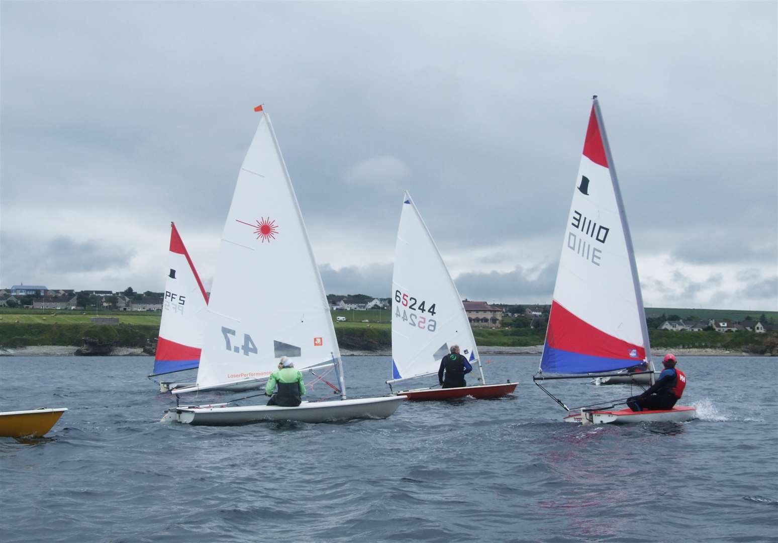 From left: Liam King (front part of boat), Ian Grant (behind), Marjory Lord, Martin Lord, Dave Lord (behind) and Thomas McAlonan in the afternoon session at Pentland Firth Yacht Club's summer regatta.