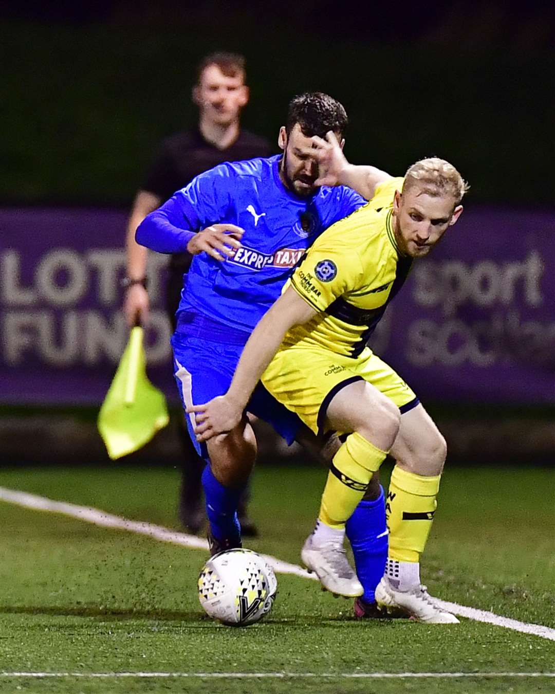 Wick Academy's Alan Hughes and Bo'ness United's Nick Locke in action at Newtown Park on Tuesday night. Picture: Mel Roger
