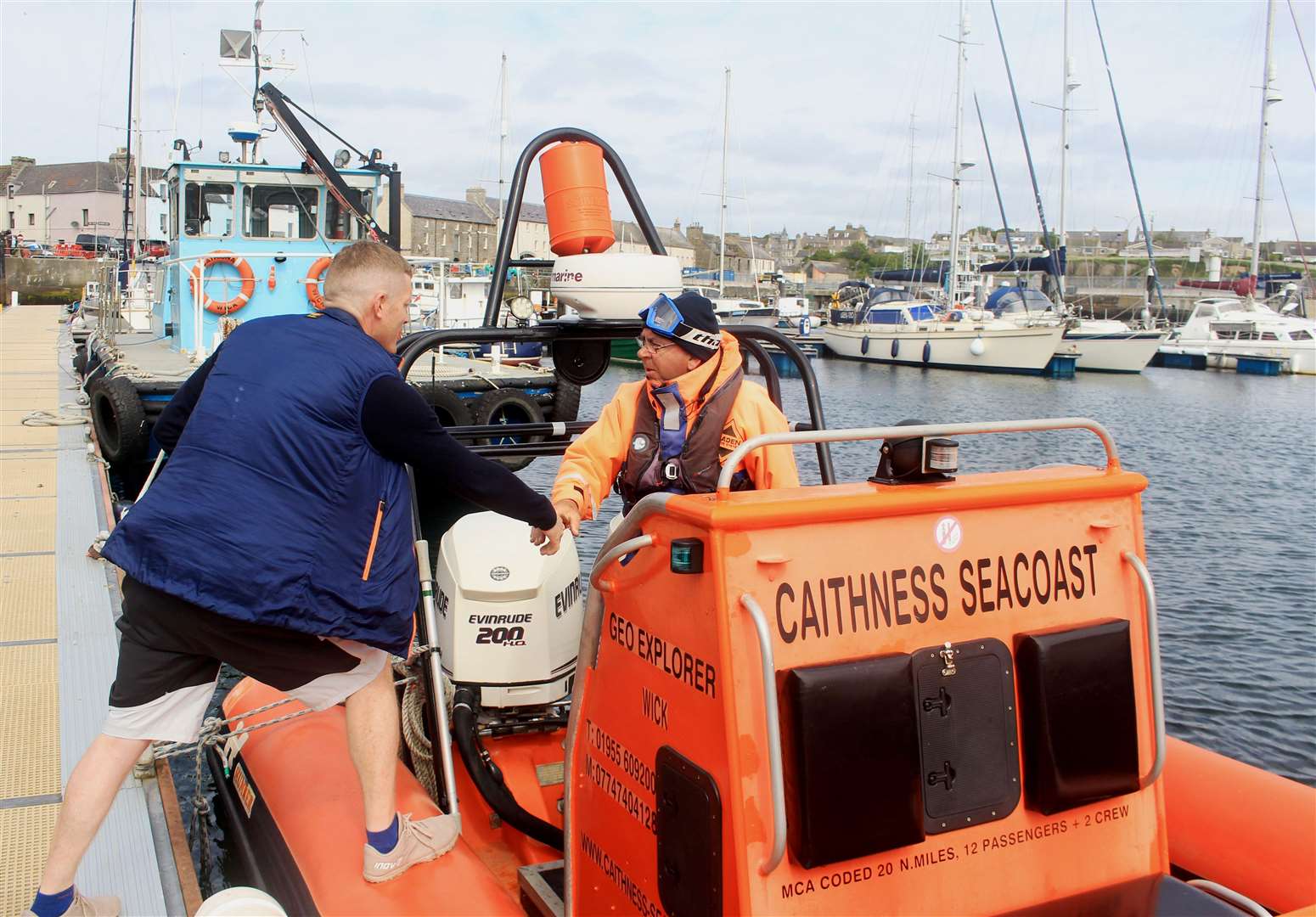 A handshake for Allan Lipp from William Munro of Caithness Seacoast. Picture: Alan Hendry