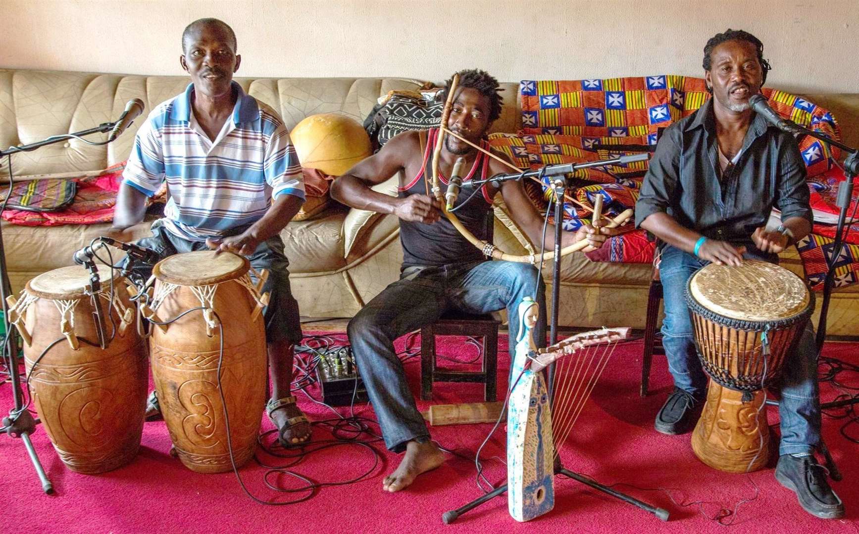Mbilou at centre is a Bwiti Nganga from Gabon and is featured with Adotey Johnson, left, and Injoly Addo of Kakatsitsi.