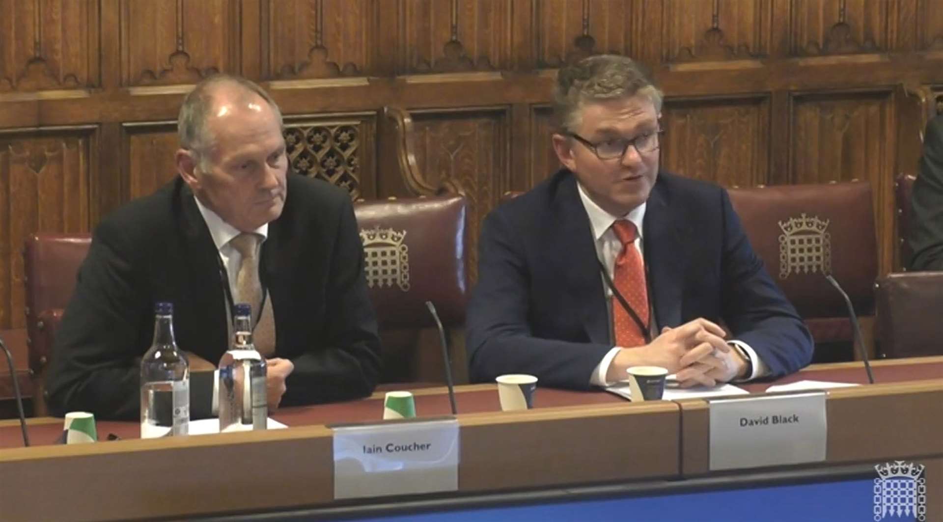 Ofwat chairman Iain Coucher and chief executive David Black giving evidence to the Industry and Regulators Committee (House of Commons/PA)