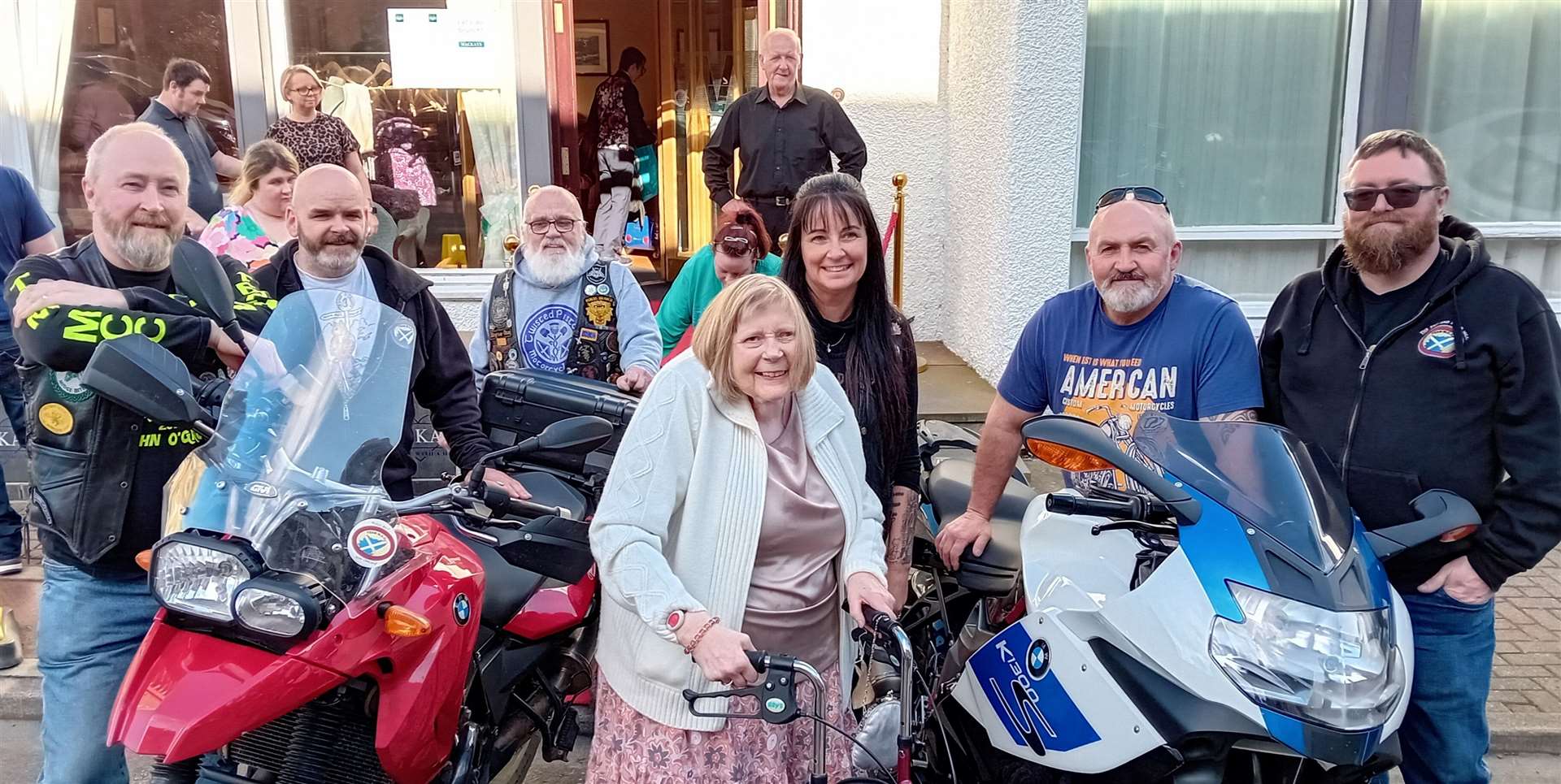 Smiles all round, and one of the biggest came from Pat Calder (centre) who got to meet the bikers outside Mackays Hotel with their top-of-the-range motorcycles. Picture: Willie Mackay