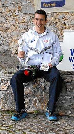 Andrew Douglas celebrates winning the Mountain Running World Cup Series.