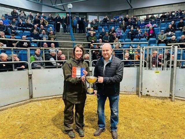 Champion Shona Gunn of Upper Dounreay with Eric Thomson of event sponsor Thomson of Sauchen.