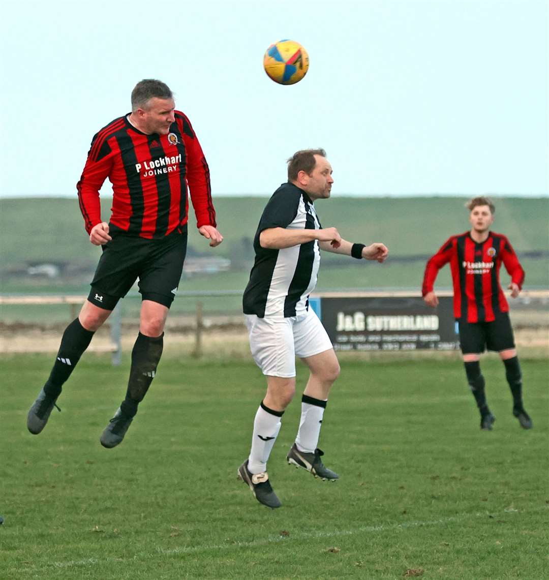 Michael Bremner scores for Halkirk with a powerful header. Picture: James Gunn