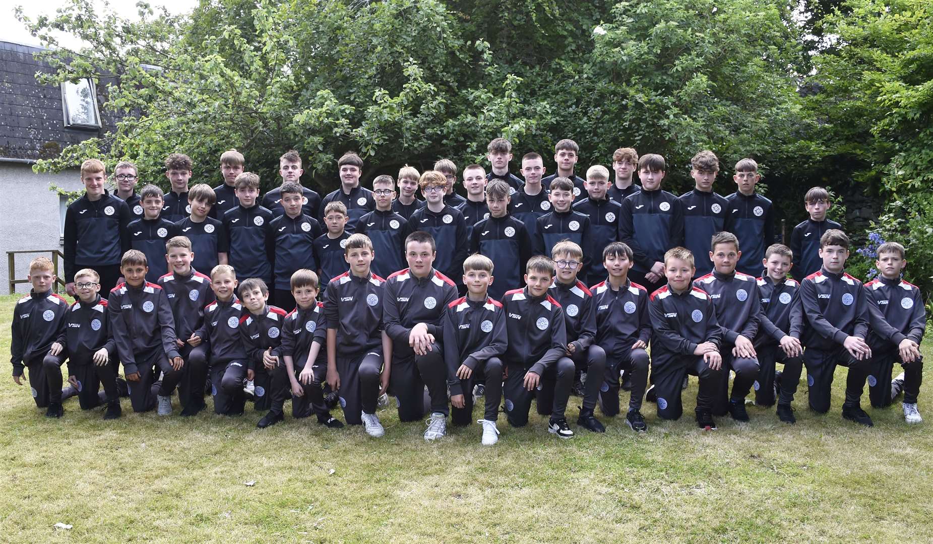 All three Caithness United age groups, U12, U14 and U16, outside the Norseman Hotel in Wick. Picture: Mel Roger