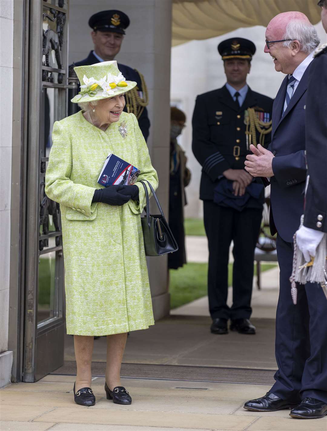 The Queen is greeted by Australia’s High Commissioner George Brandis before the service. (Steve Reigate/Daily Express/PA)
