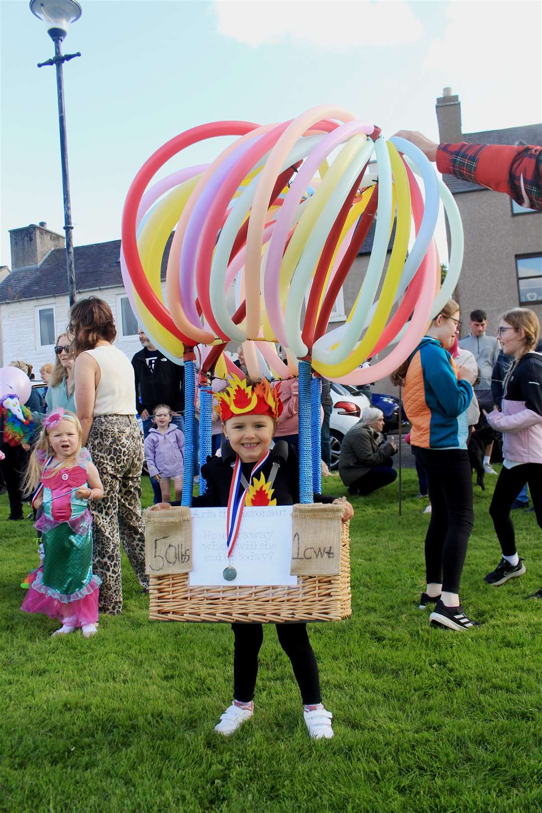 Up, up and away: Aria Dewhurst (4) won a first prize with her hot-air balloon. Picture: Alan Hendry