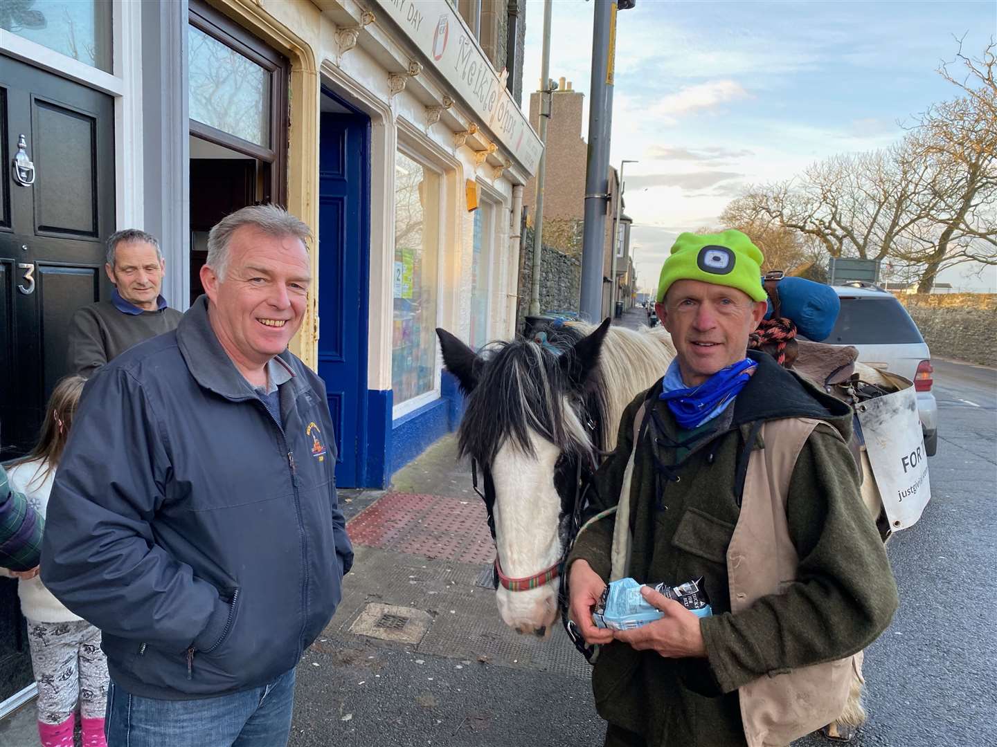Wick lifeboat crew member Gordie Morrison with Barry and Barney outside the pop up lifeboat souvenir shop located at A New Ewe hairdressers, Thurso Street. Picture: John Taylor