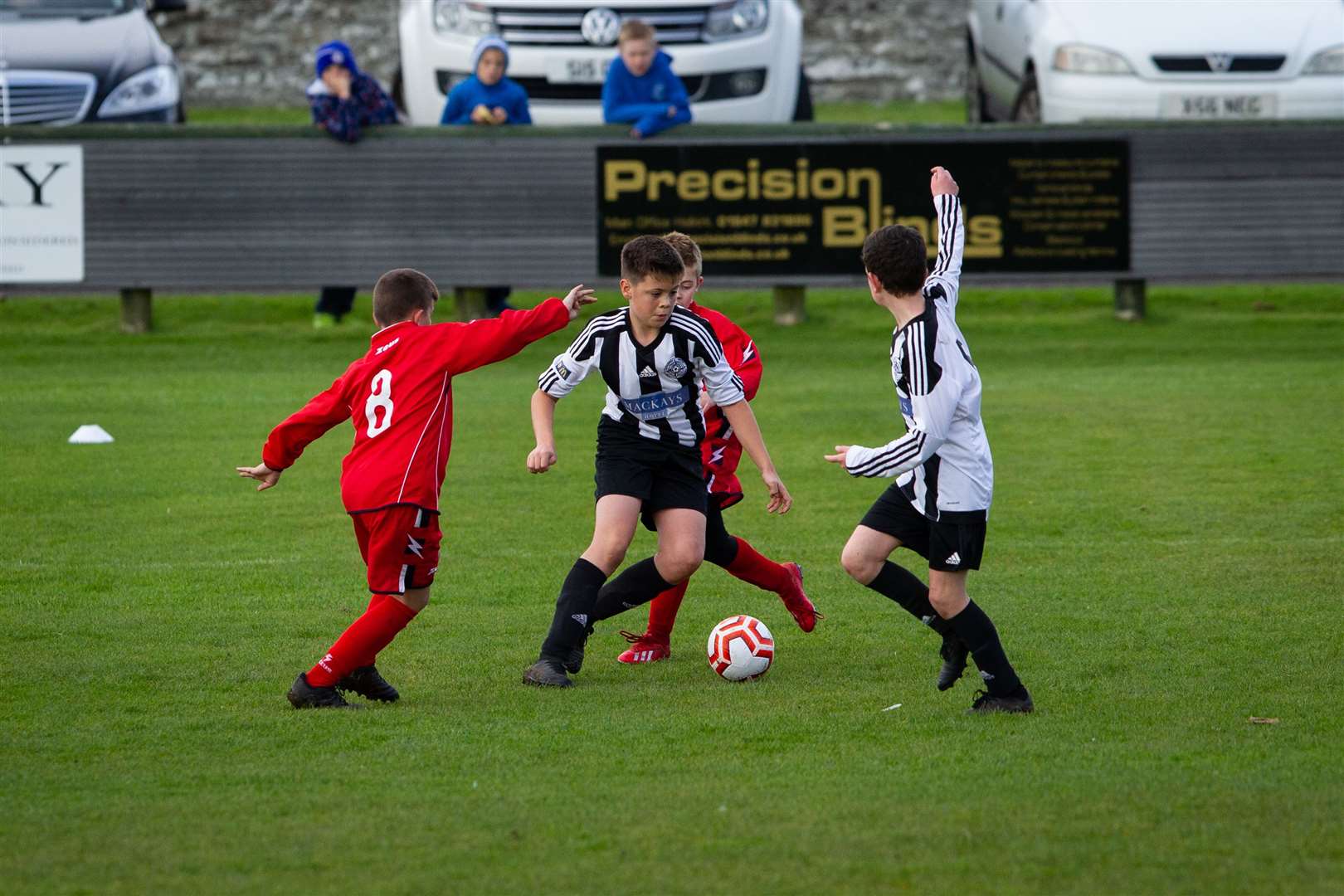 Owen Bain stepping inside two defenders with Sam Shearer watching on. Picture: Gareth Watkins
