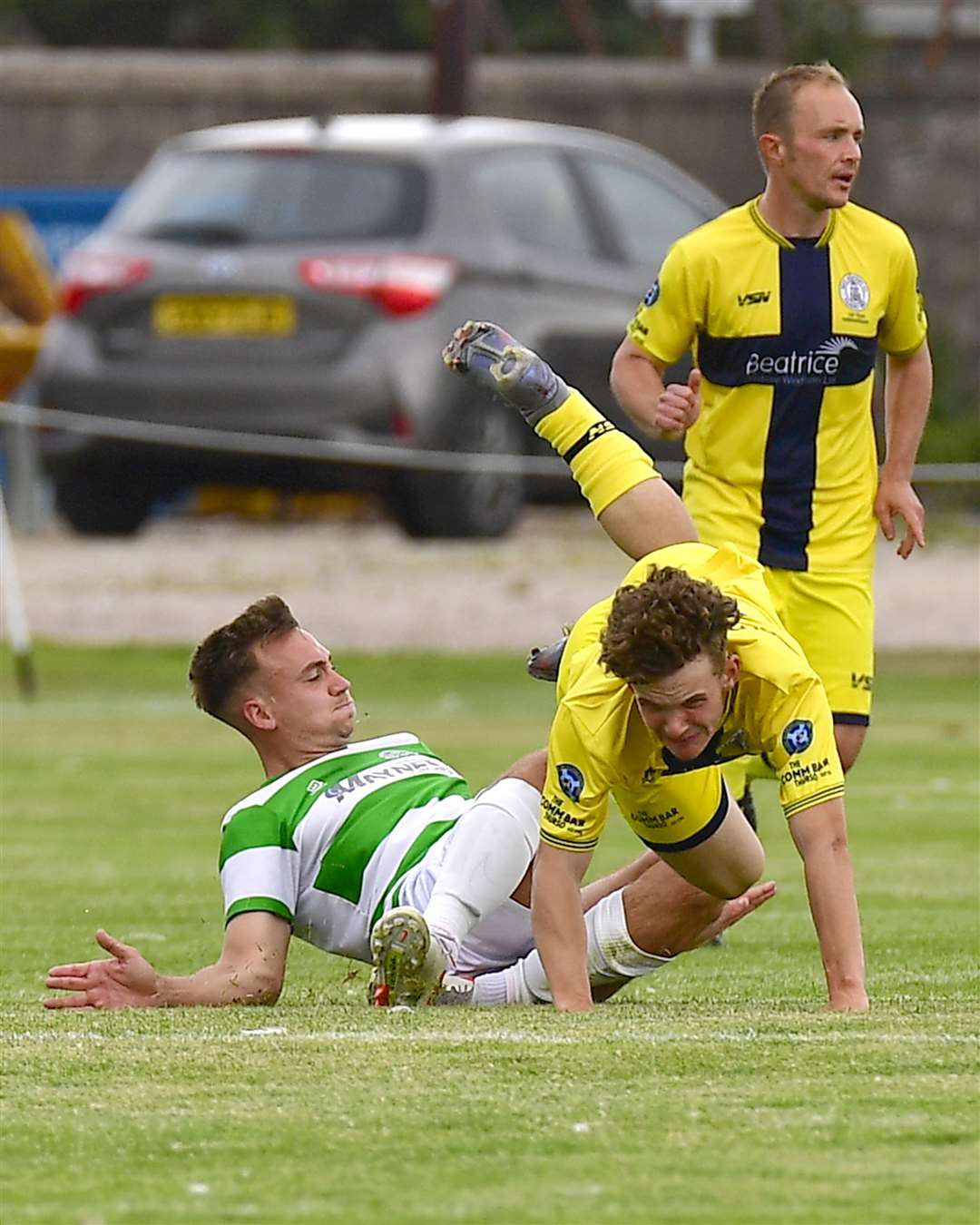 Mark Munro's match ended early after he was caught by a hefty challenge from Buckie's Sam Pugh. Picture: Mel Roger