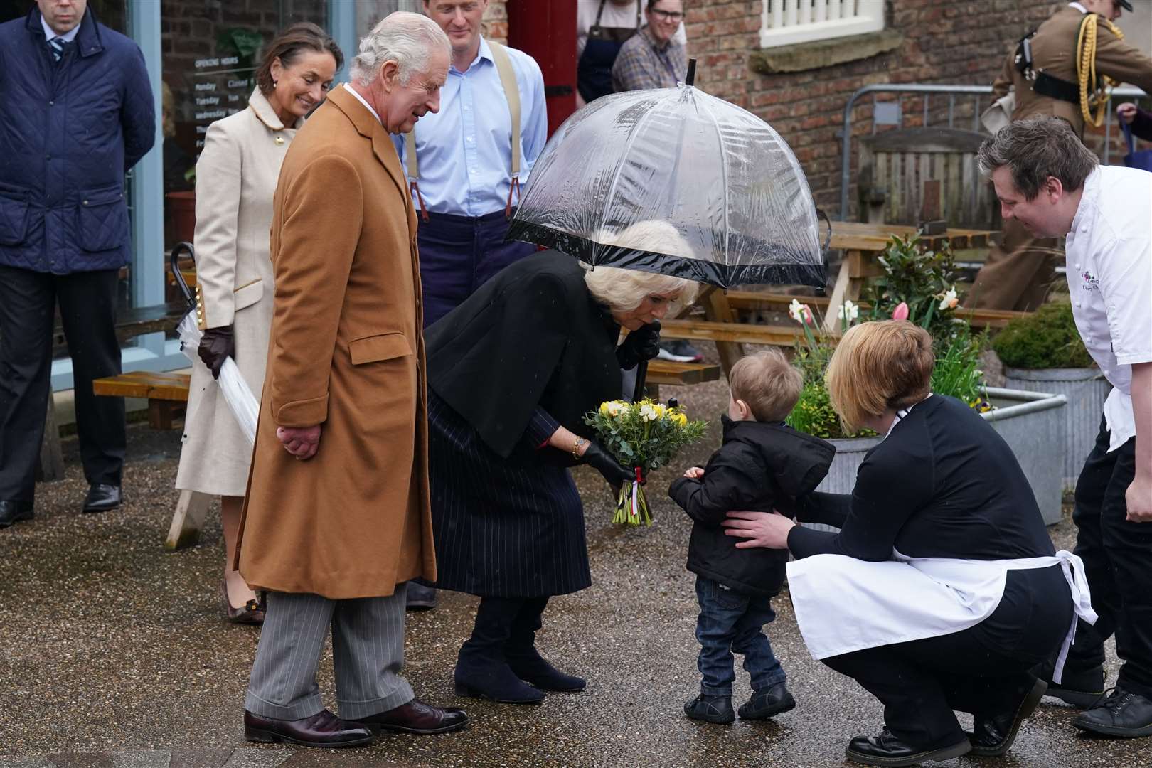 The King and the Queen Consort during their visit to Talbot Yard Food Court in Yorkersgate, Malton, North Yorkshire (Owen Humphreys/PA)