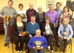 Prize winners from the past season’s competitions on Thurso golf course display the silverware after the club’s annual presentation.