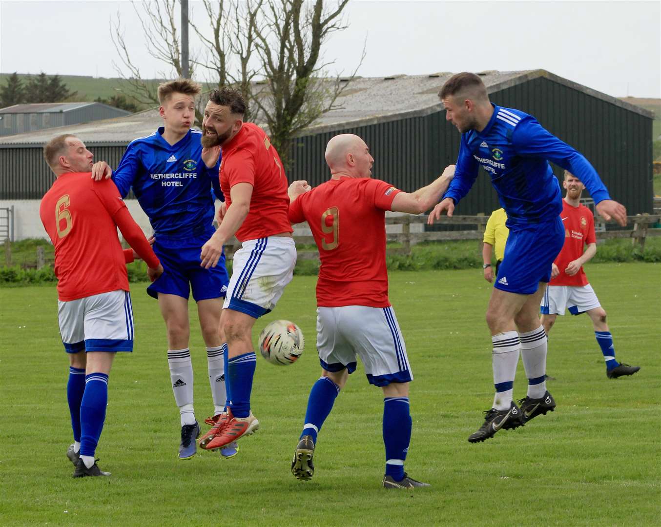 A scramble in the Lybster penalty area.