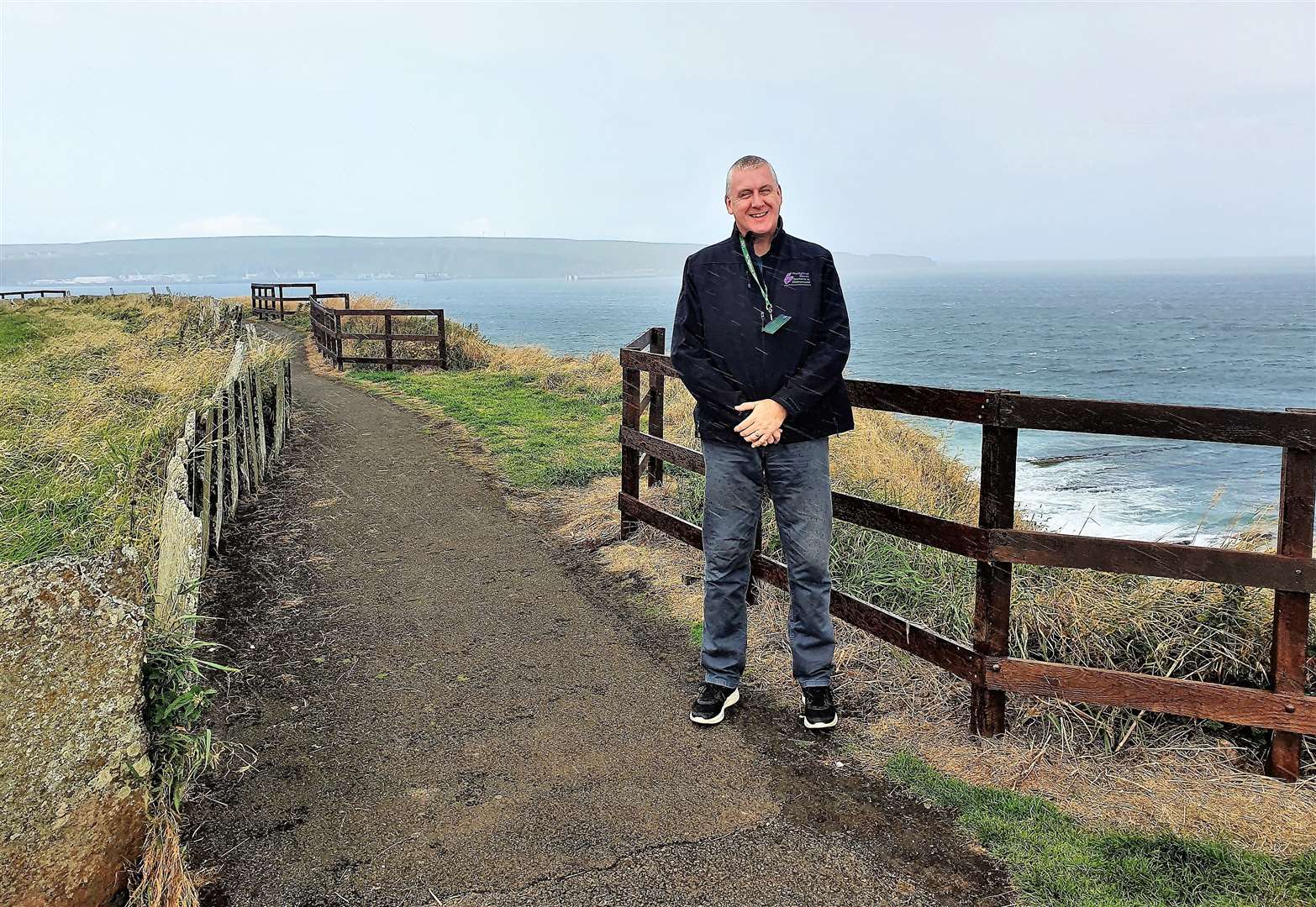 Community payback supervisor David Souter with the new fencing at Victoria Walk in Thurso.