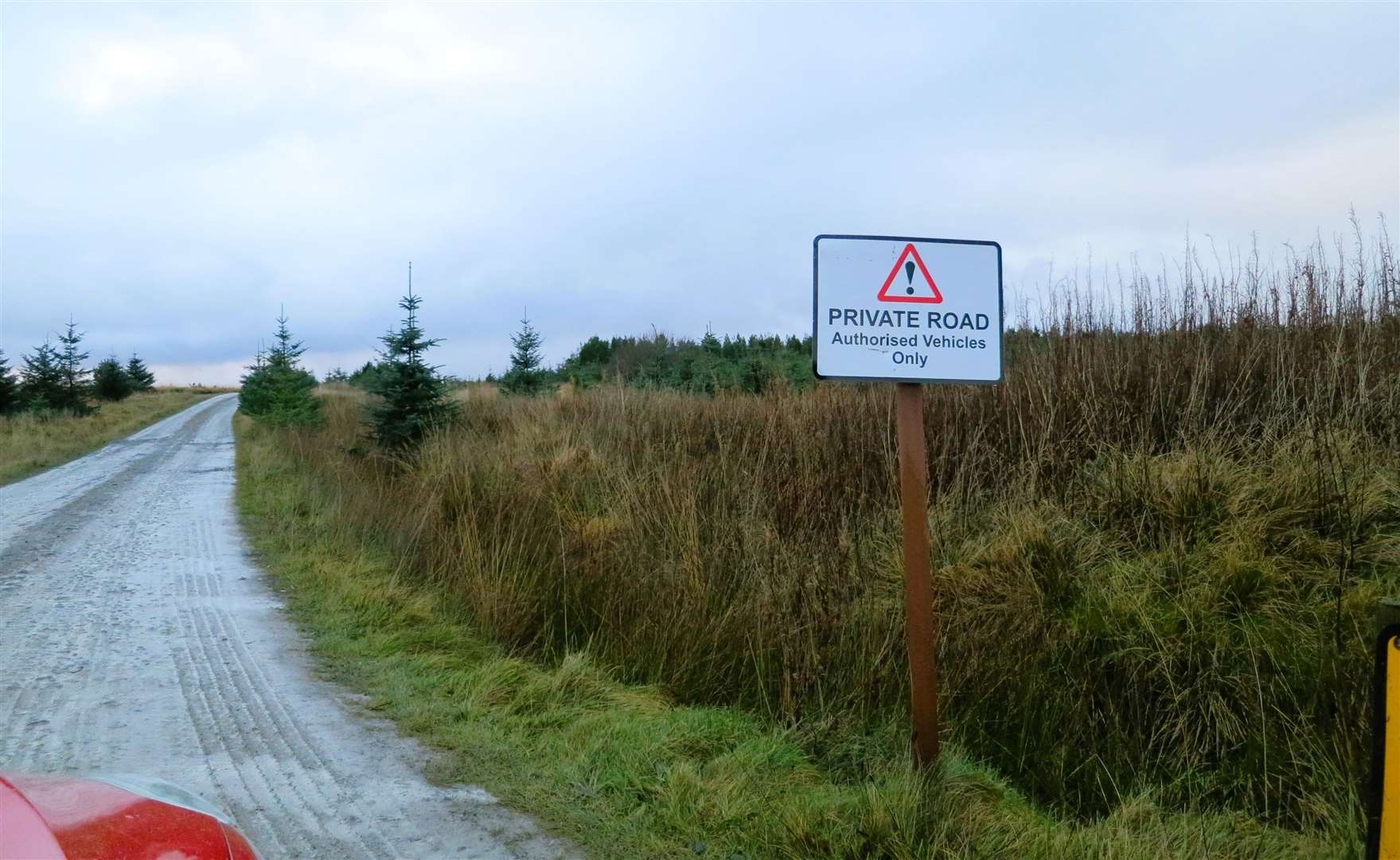 The road to Altnabreac is riddled with potholes and used mainly by lorries carrying timber. The sign says only authorised vehicles may use it. Picture: DGS