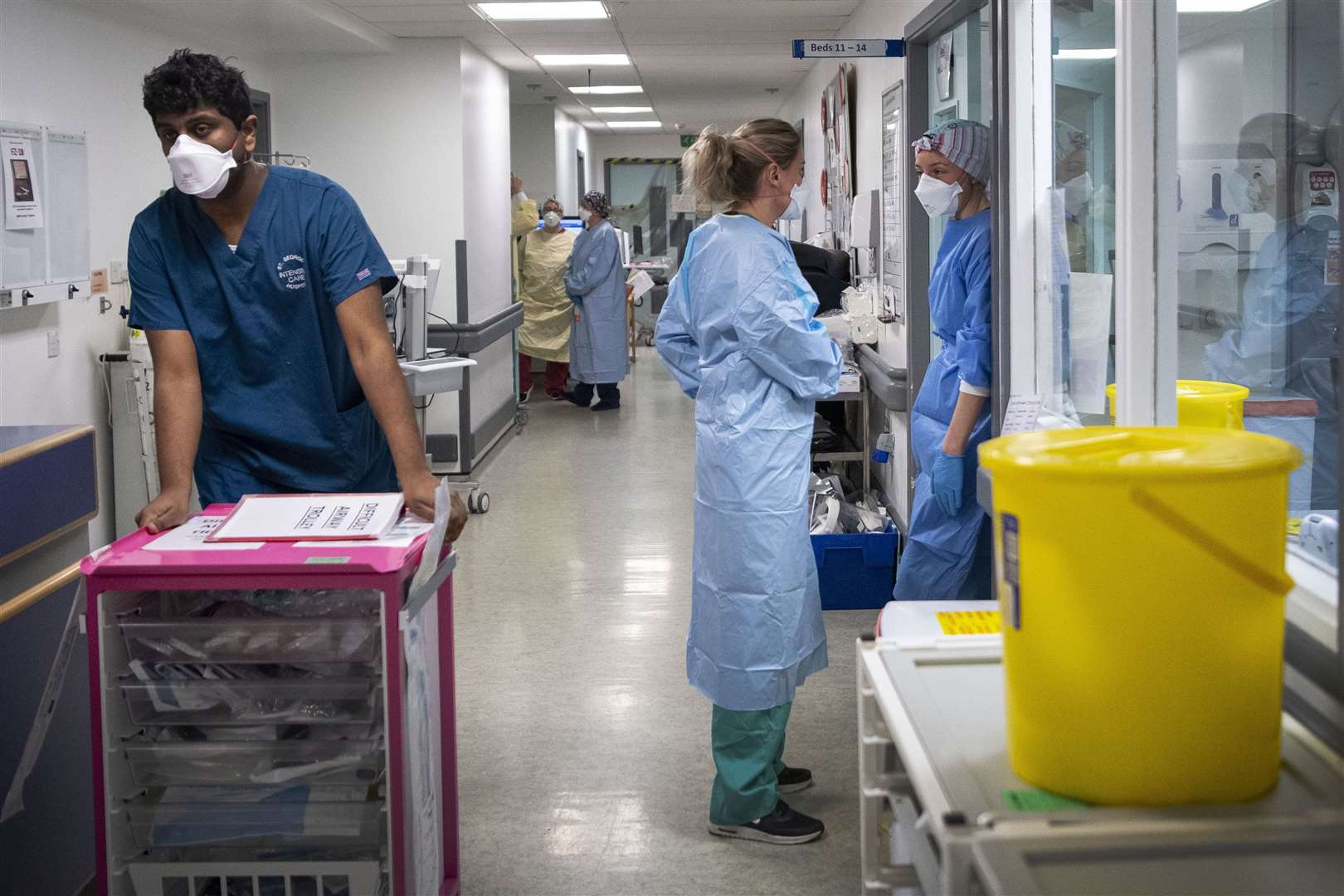 Staff members in the ICU at St George’s Hospital in Tooting (Victoria Jones/PA)