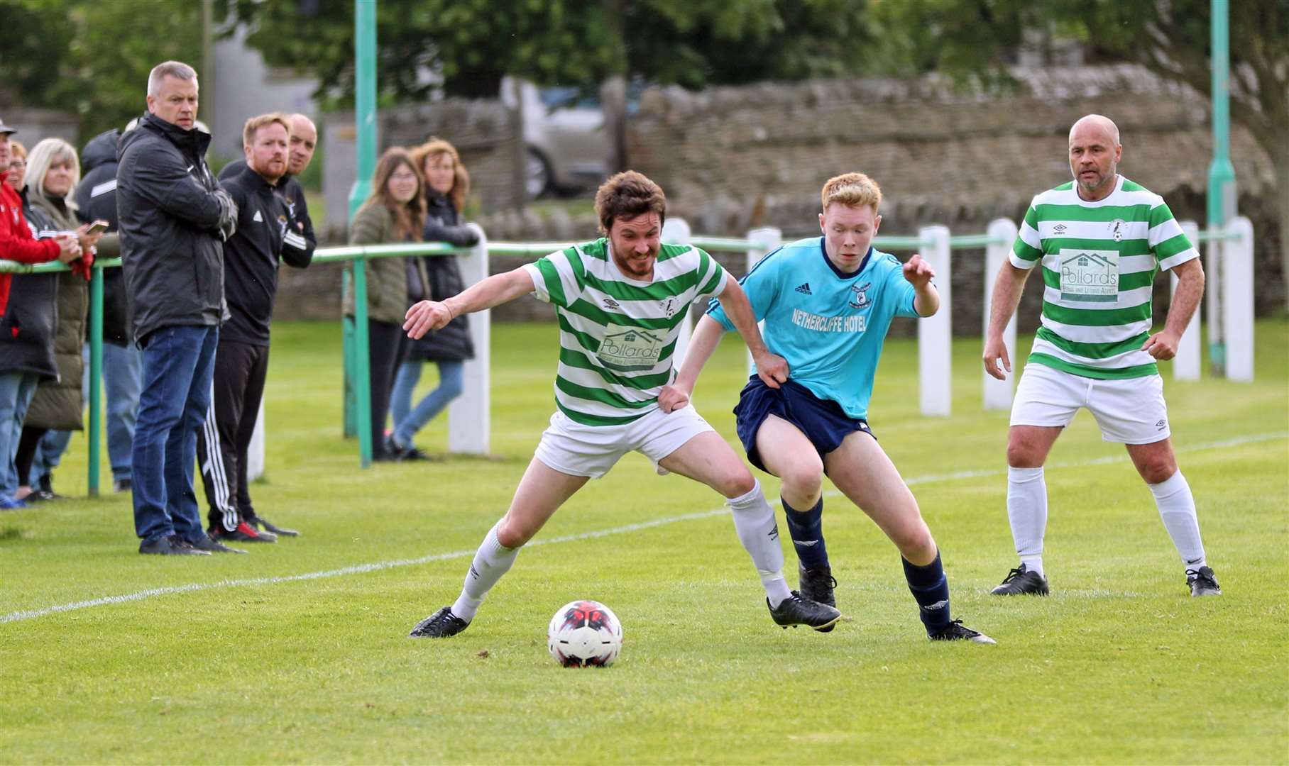 Kerr Mackay of Castletown and Wick Groats' Ross Mackay tussle for the ball. Picture: James Gunn