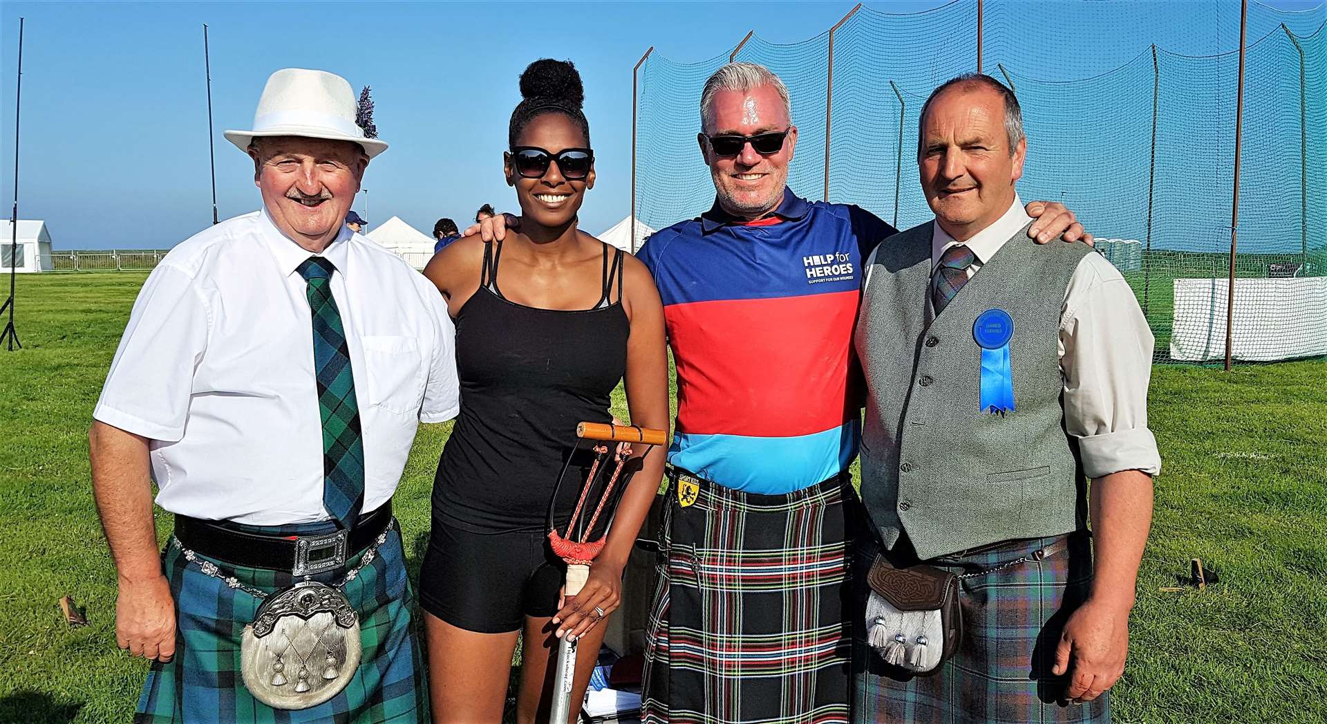 Mey Games compere Willie Mackay (left) with Californian athlete Jarvina Routt and her husband Stan along with games convener Henry Gunn at last year's event.