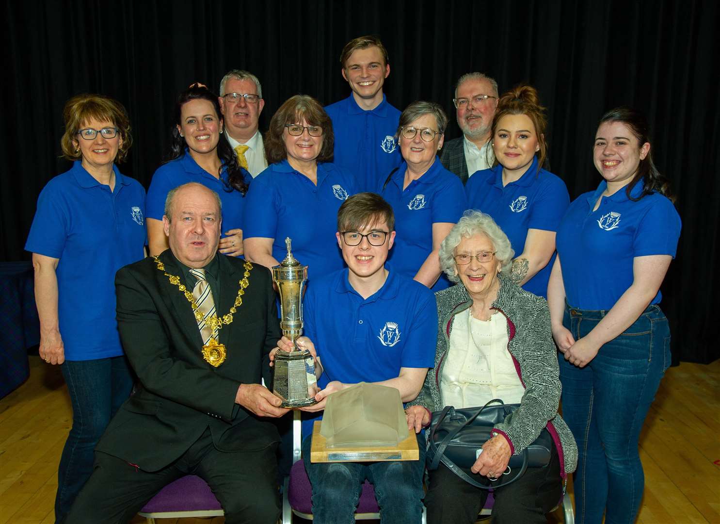 Some of the winning team at the presentation along with Nairn Provost Laurie Fraser (front right) and Wick Players' stalwart Kathlyn Harper (front right).