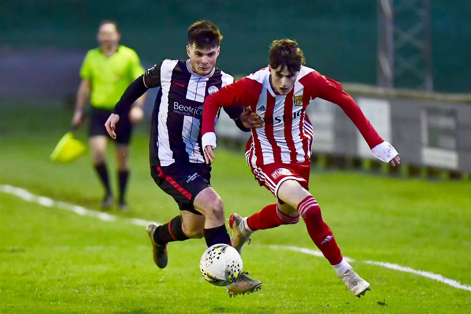 Sean Campbell of Wick Academy in pursuit of Formartine's Kevin Hanratty. Picture: Mel Roger