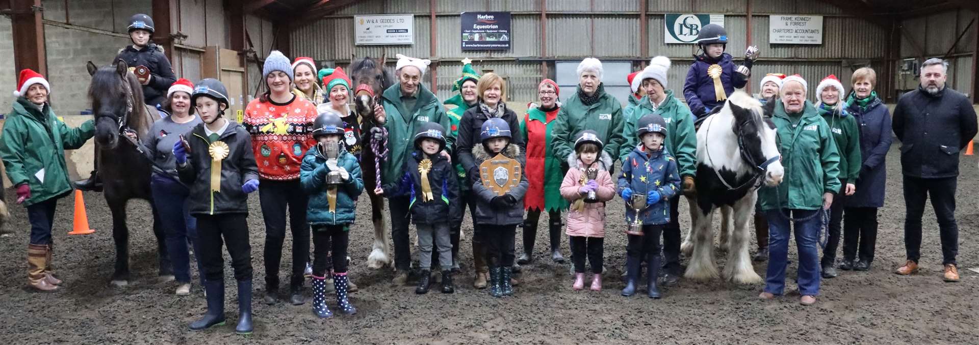 Members of Ride 1 with coach Erin Russell and helpers. The trophies and rosettes in this ride were presented by Christa Macdonald, Melanie Swanson and Willie Durrand from Lodge St Peter. Picture: Neil Buchan