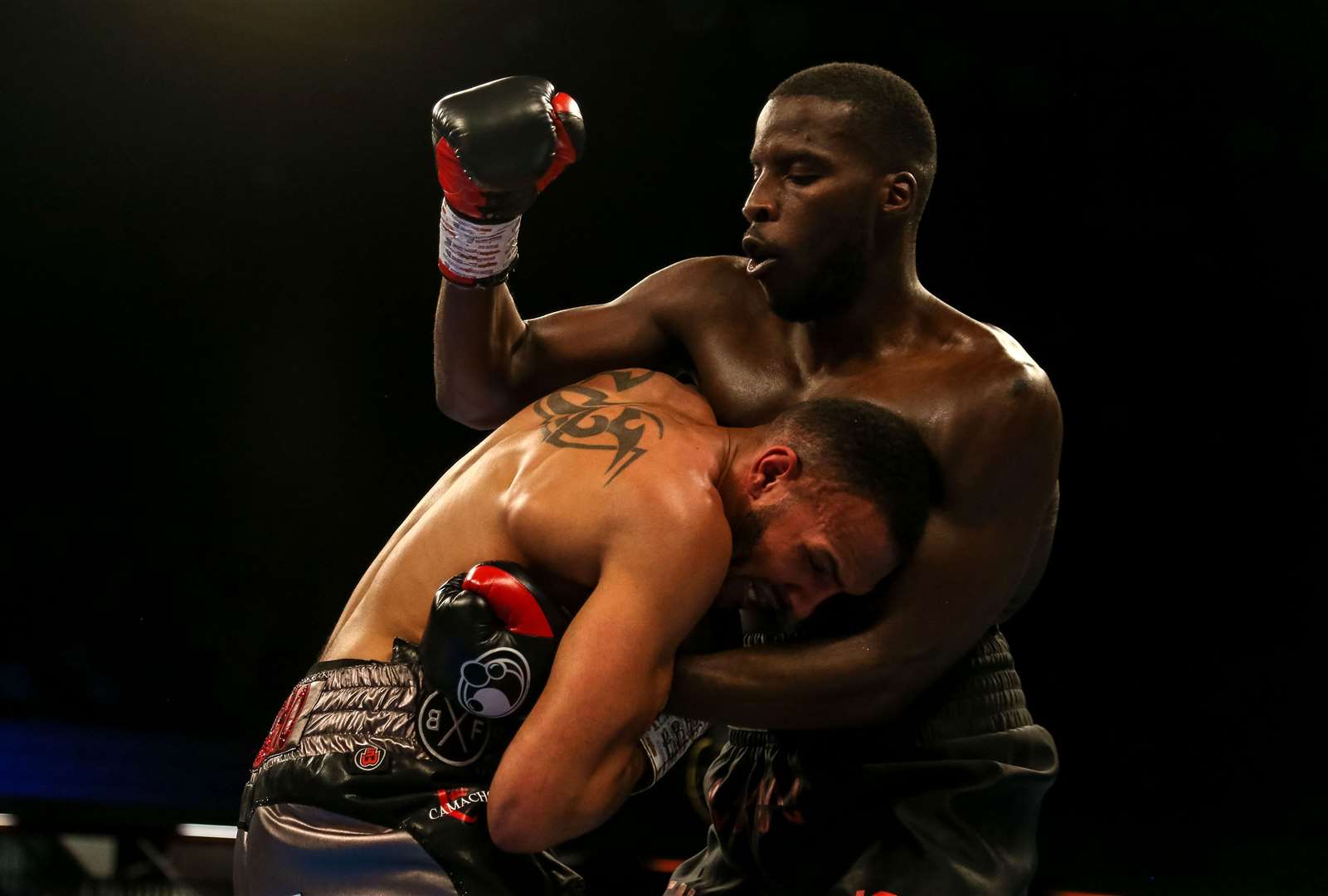 Lawrence Okolie (right) in action against Wadi Camacho during their British and Commonwealth Championship bout at the Copper Box Arena, London (PA)