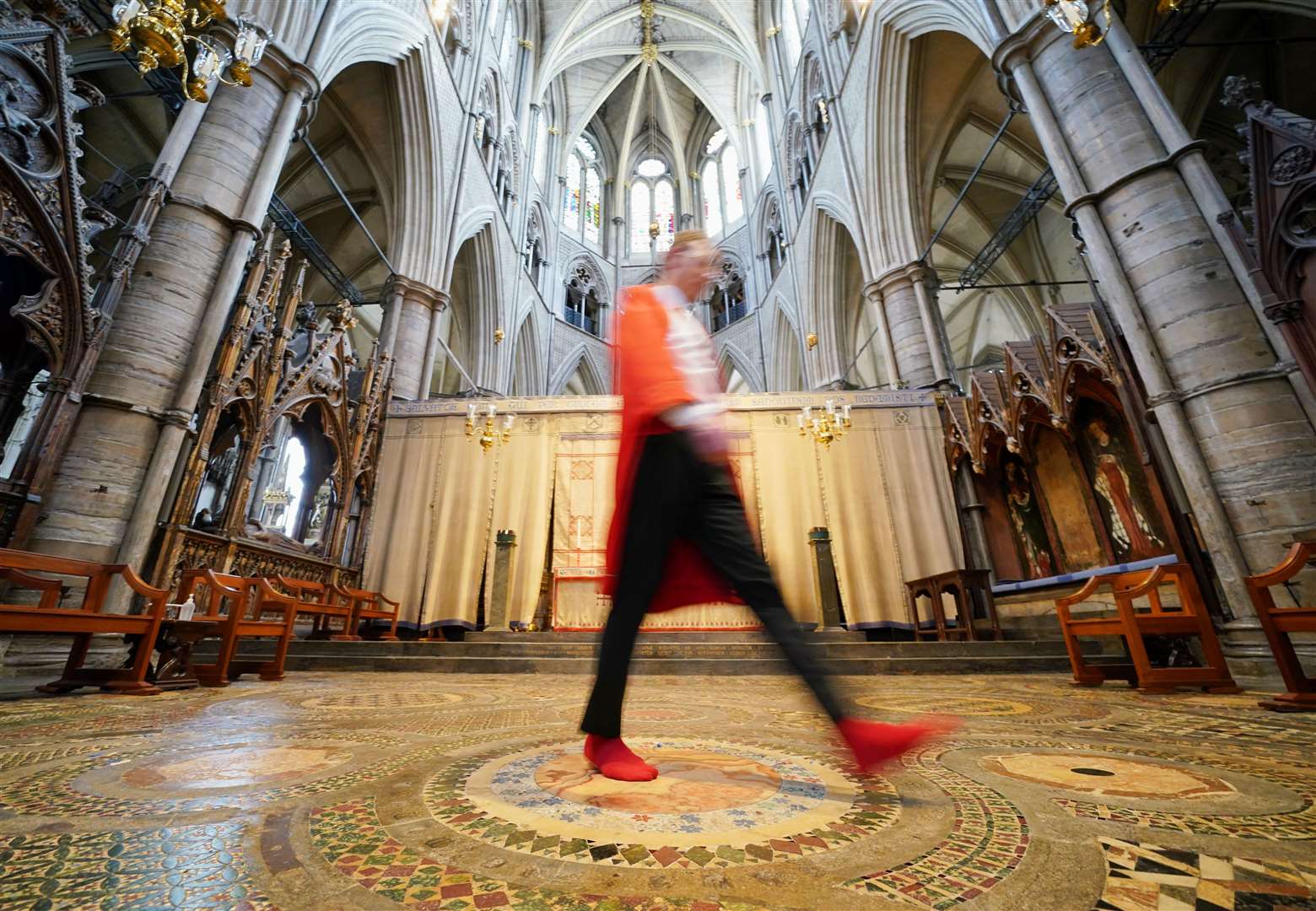 The Abbey Marshal walks across the centre of the medieval pavement (Jonathan Brady/PA)