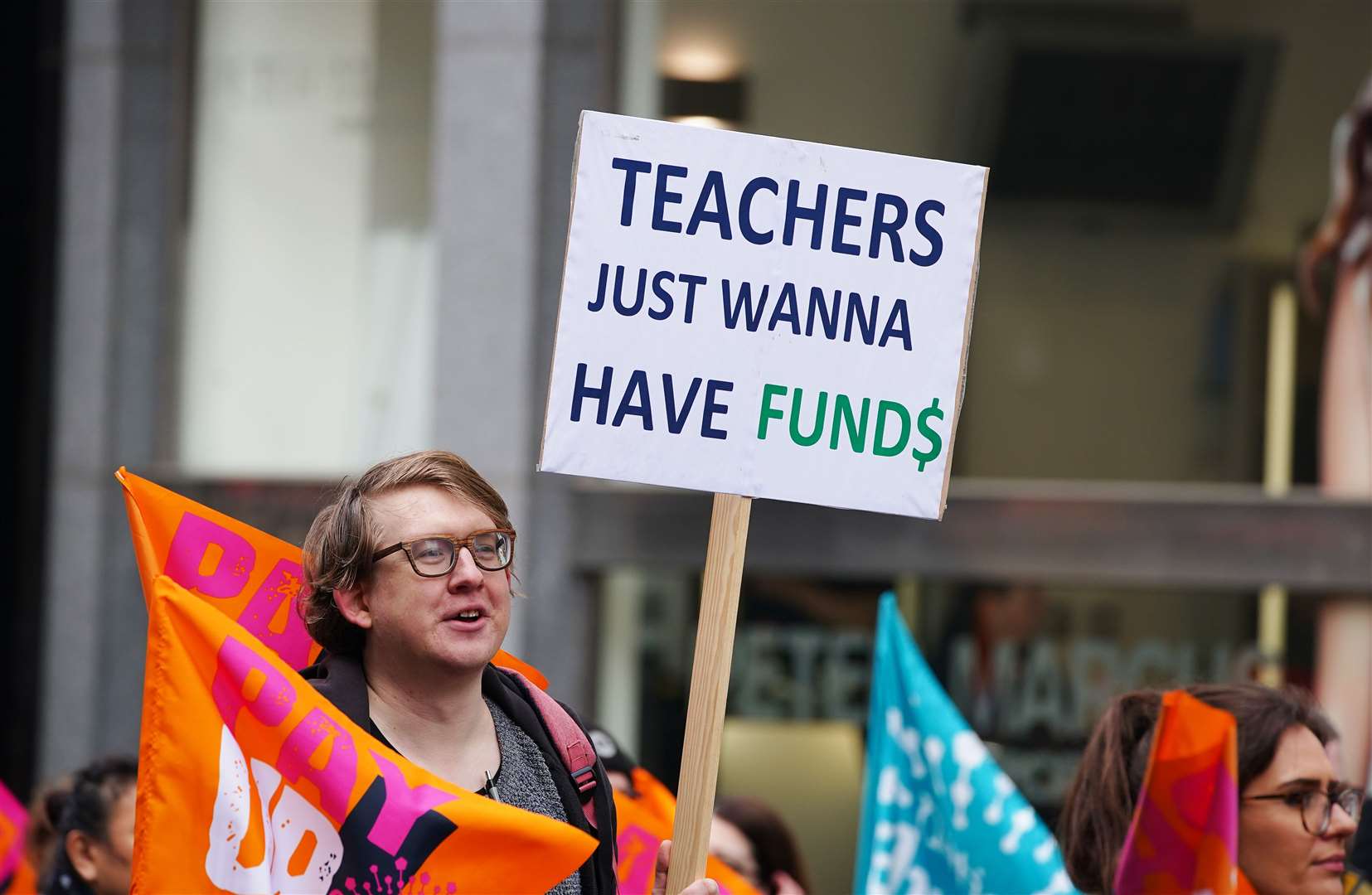 Members of the National Education Union during a rally (Peter Byrne/PA)