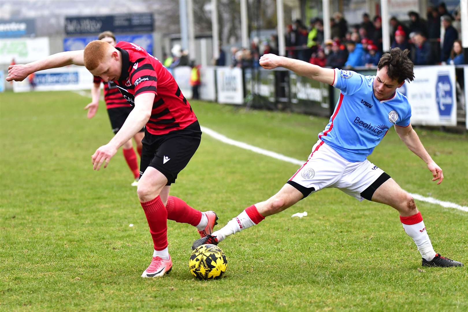 Marc Coghill at full stretch to dispossess Inverurie's Aidan Wilson. Picture: Mel Roger