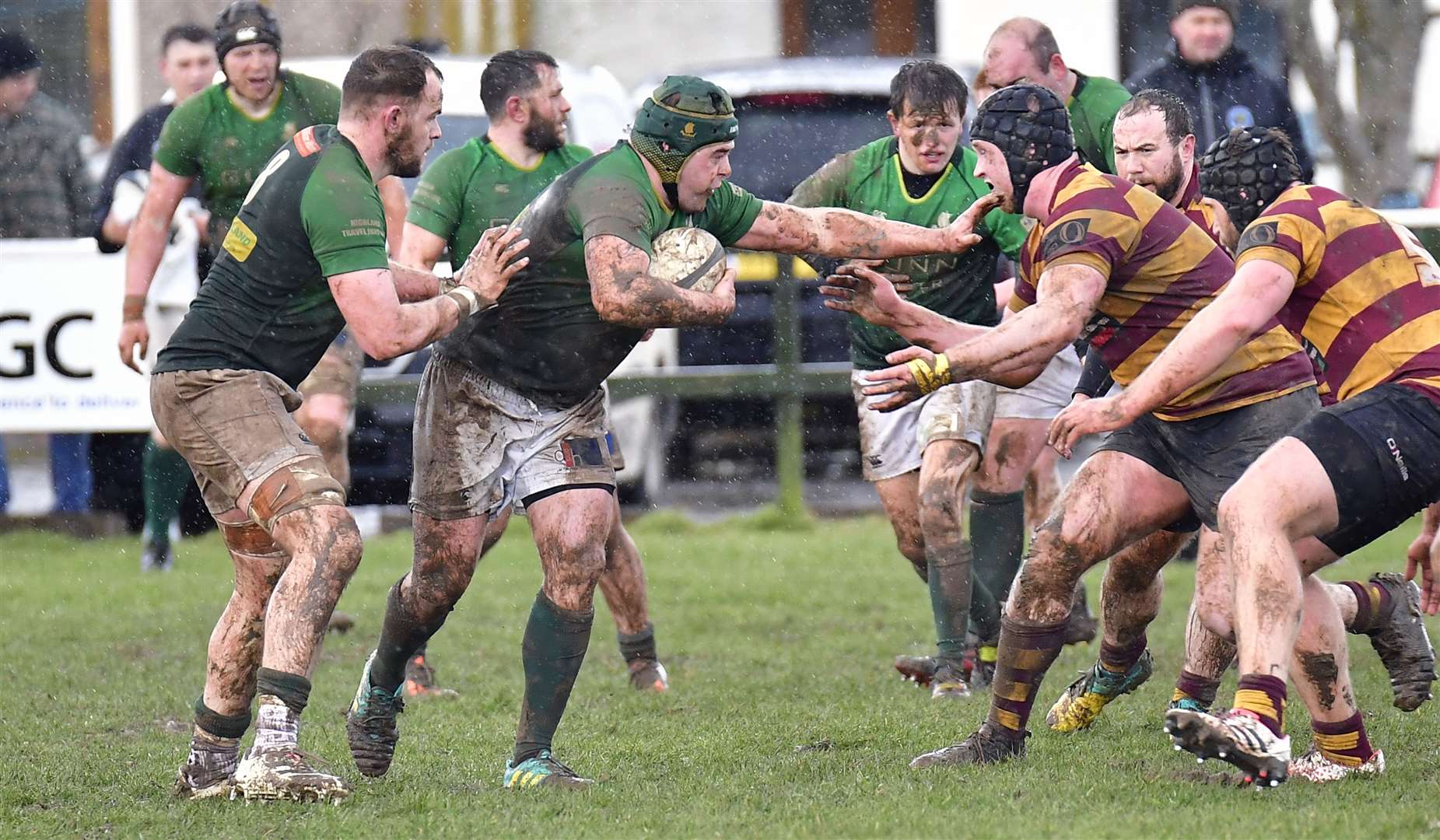 Hamish Coghill holds off a challenge during the Greens' latest outing, the Caley 1 League win against Ellon at Millbank. Picture: Mel Roger